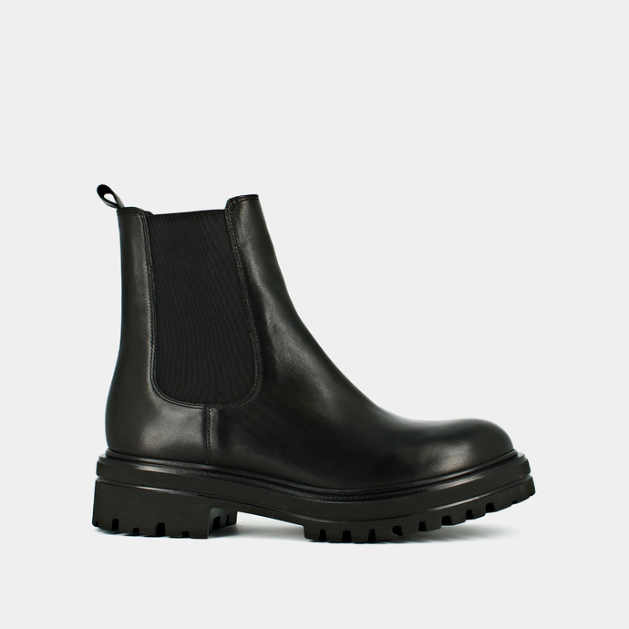 Boots à semelles crantées et élastiques  en cuir noir