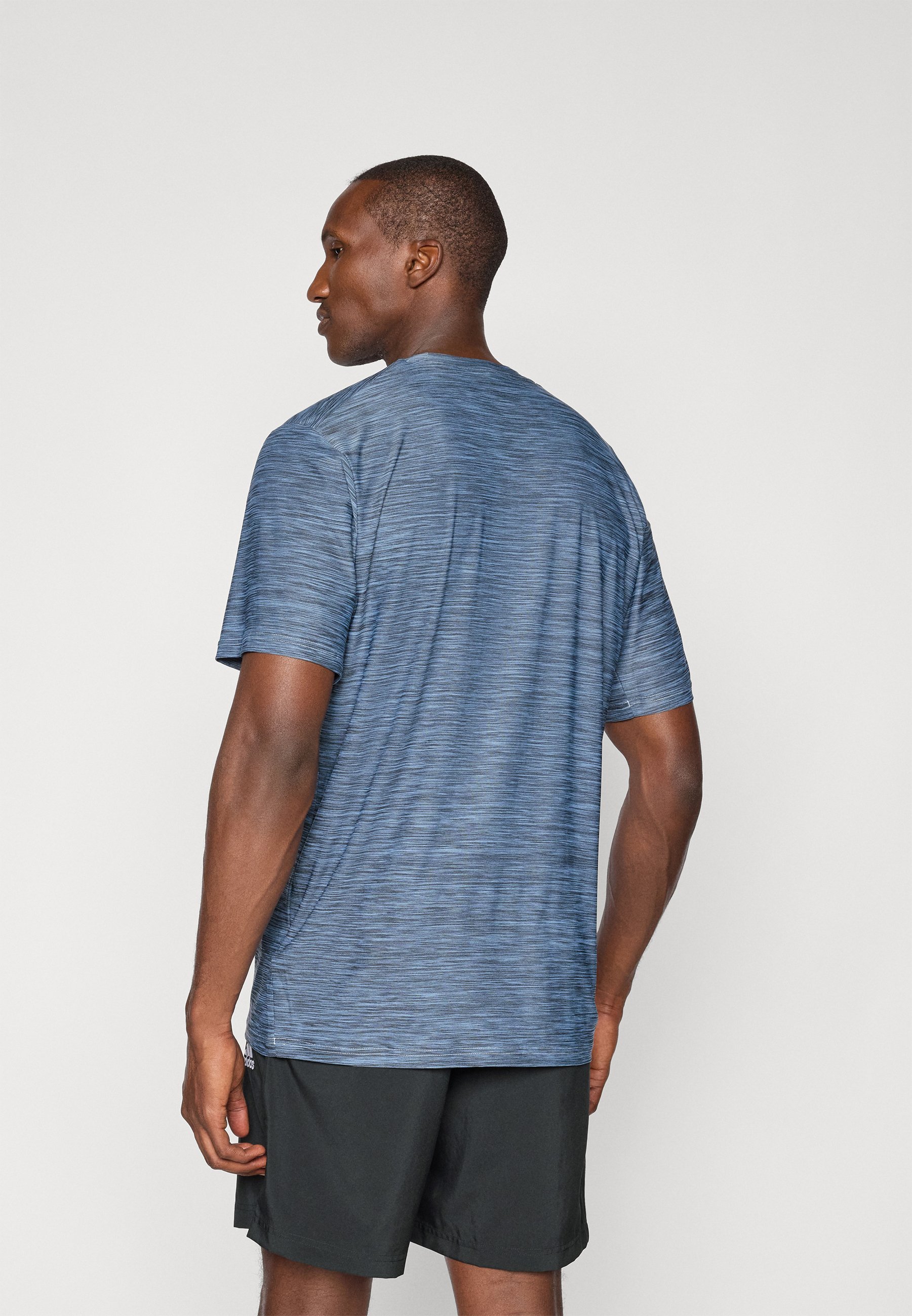 adidas Performance STRETCH - Sport T-shirt - lichtgevend blauw/zwart
