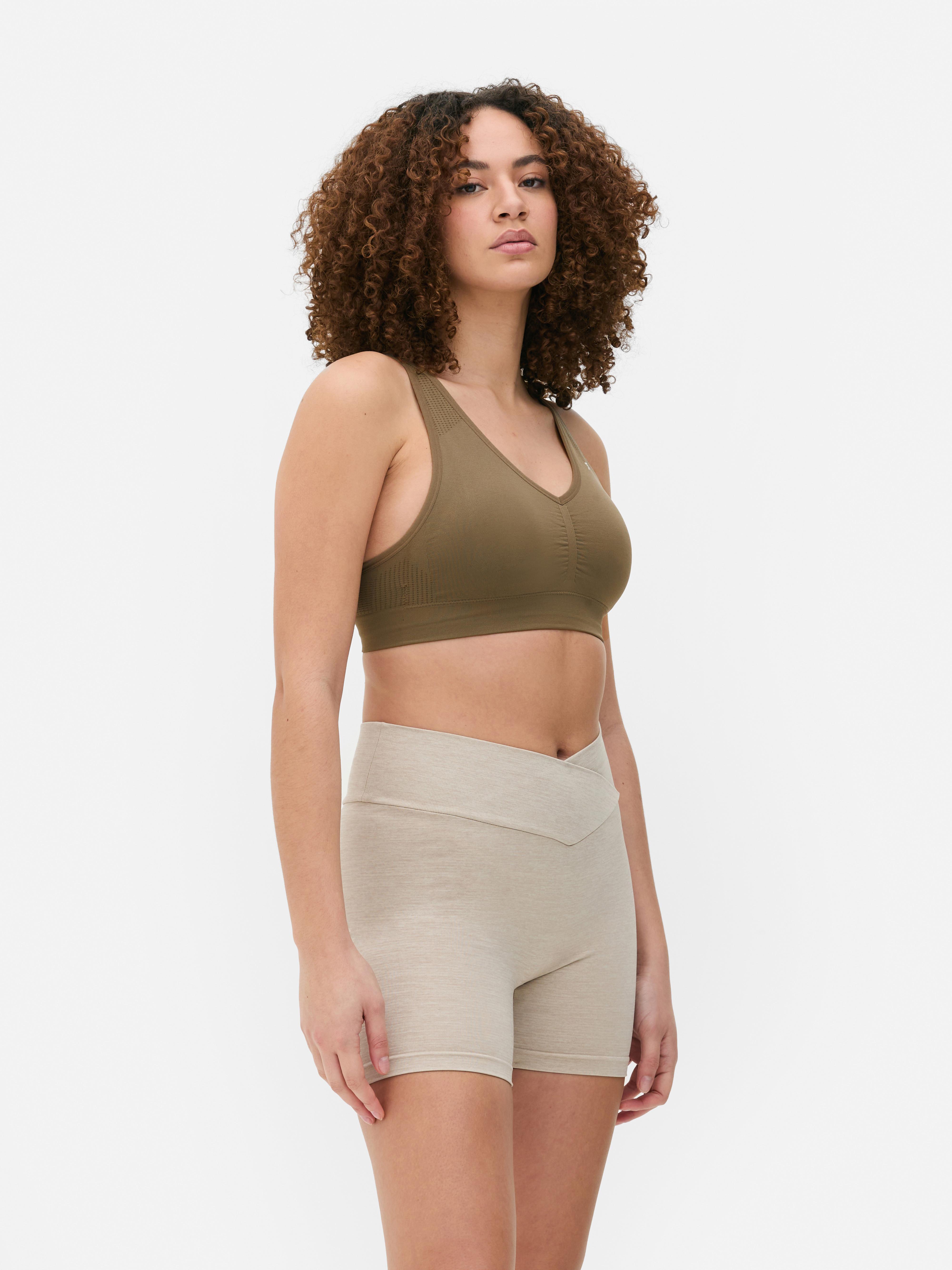 Seamless sports bras, set of 2. Two unpadded sports bras with adjustable straps.