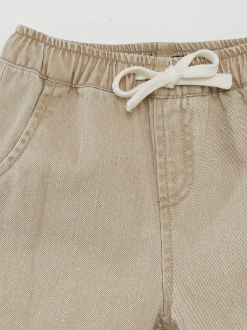 Spodnie jeansowe typu paperbag - BEŻOWE
