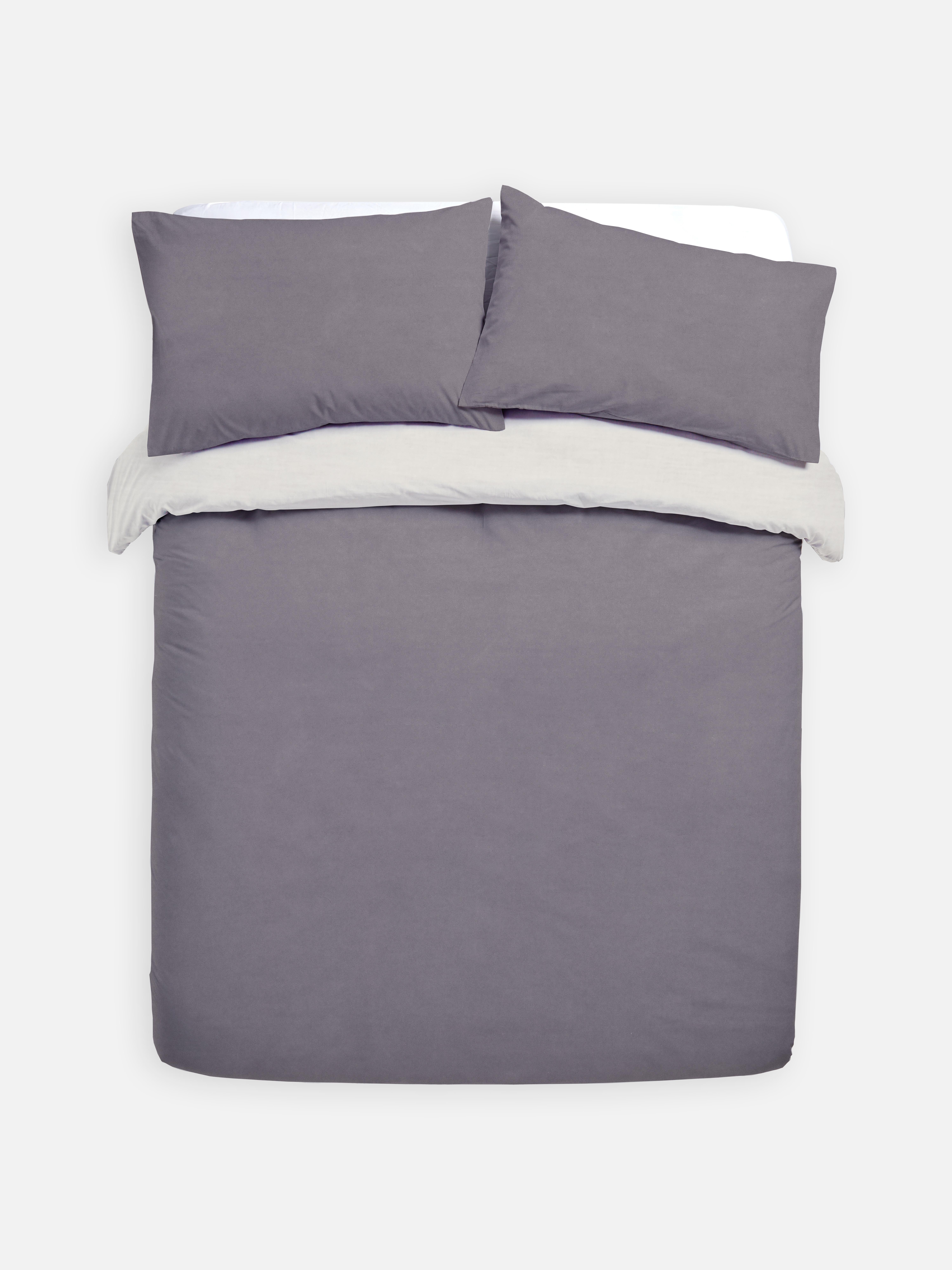 Set de husă de pilotă dublă reversibilă, în două culori. O husă de pilotă dublă cu design reversibil în două culori.