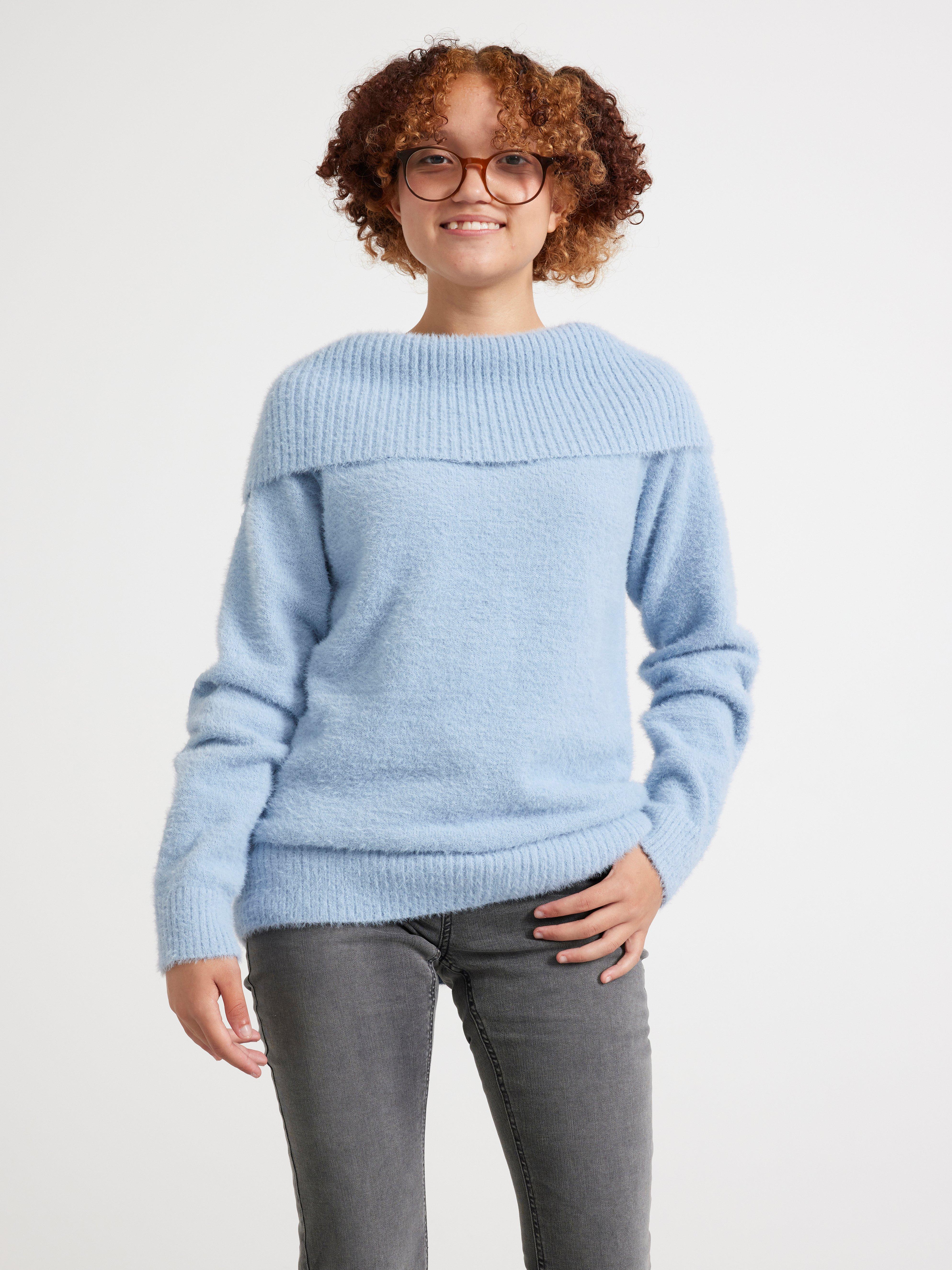 Polo de punto azul claro