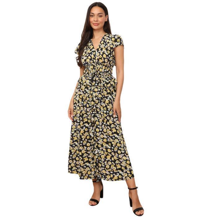 Vestido largo estampado floral con volantes en la parte delantera y en la cintura. Cuenta con dos filas de elástico en la cintura y...