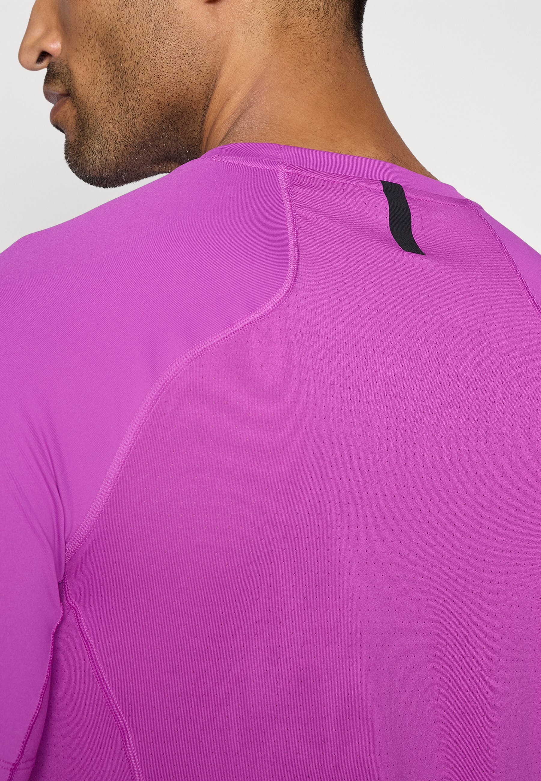 T-shirt de sport Nike Performance TOP - violet vif/noir