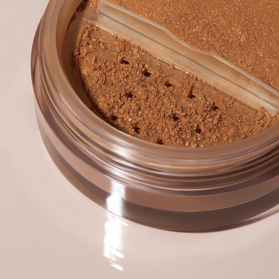 elf Cosmetics pūdera Halo mirdzuma fiksācija - 6,8 g