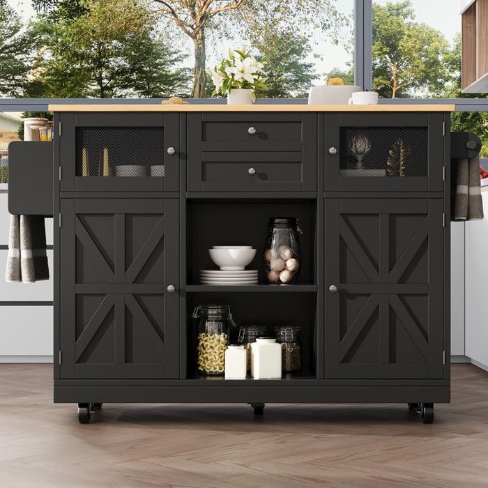 Carrito de cocina negro con tapa extensible de 70x120 cm, 5 ruedas giratorias y 2 cajones profundos.