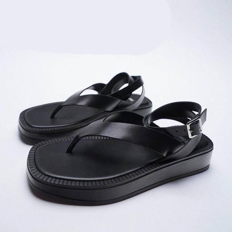 Sandales plates d'été pour femmes, en cuir noir, style tong, à lacets, semelle épaisse et bride cheville.