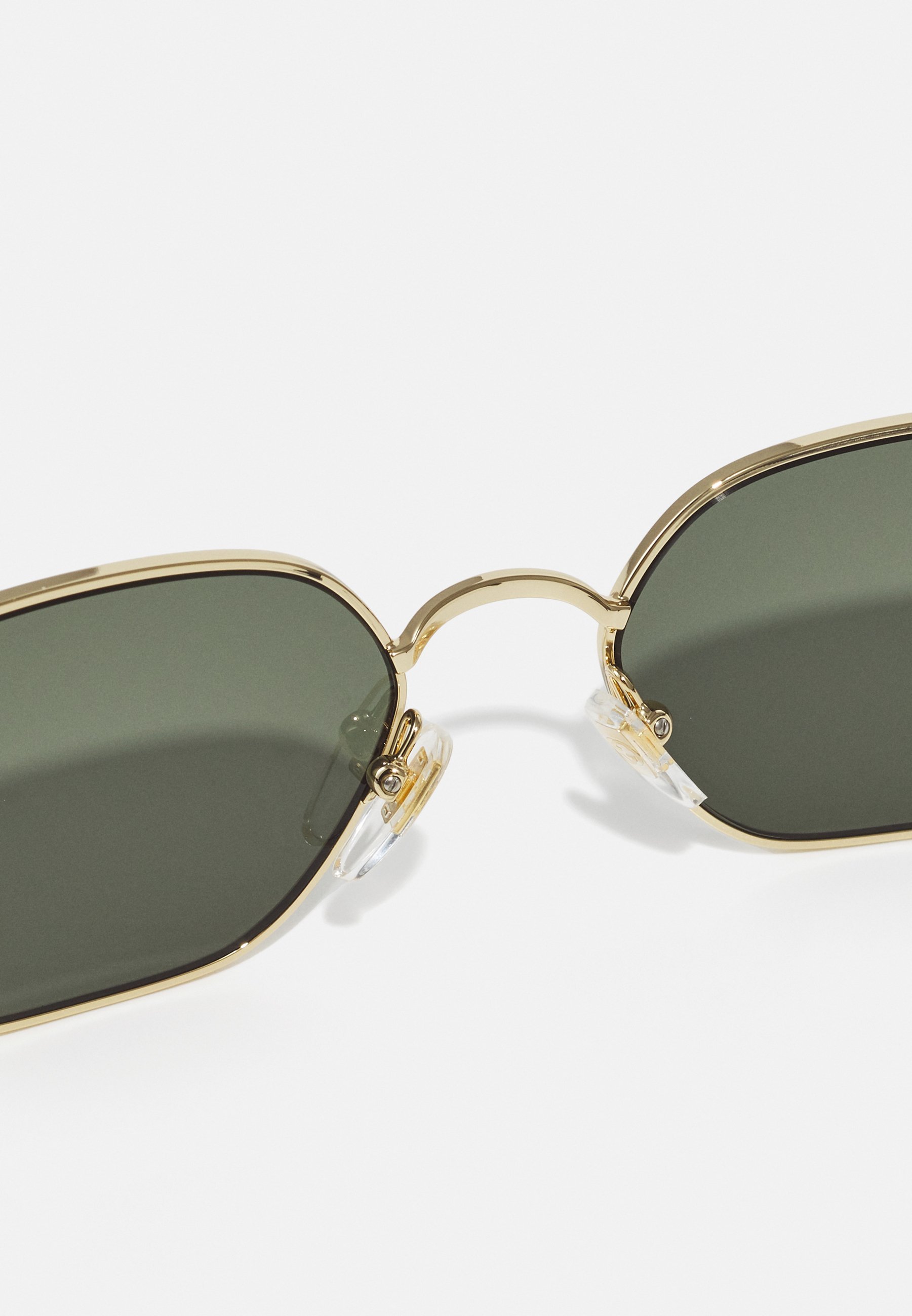 Lunettes de soleil Gucci unisexes - dorées/noires/grises