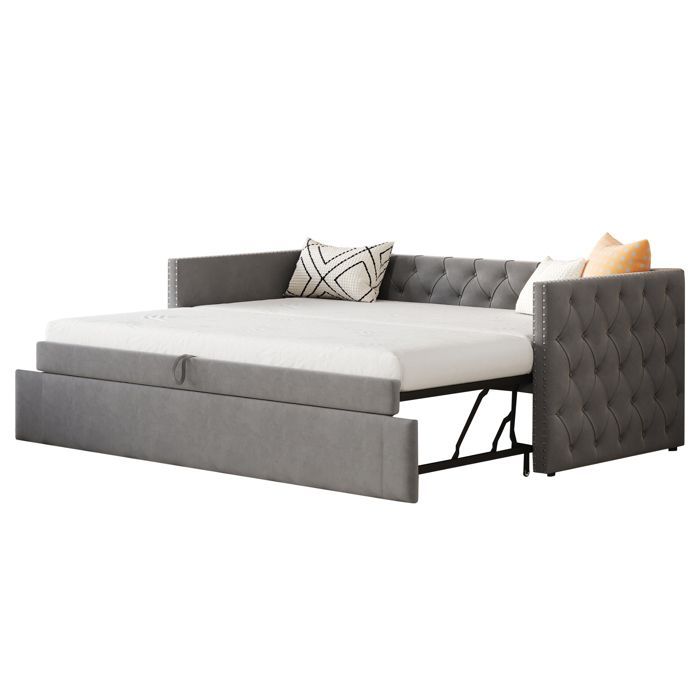 Lit banquette convertible en velours gris avec capitonnage, sommier à lattes