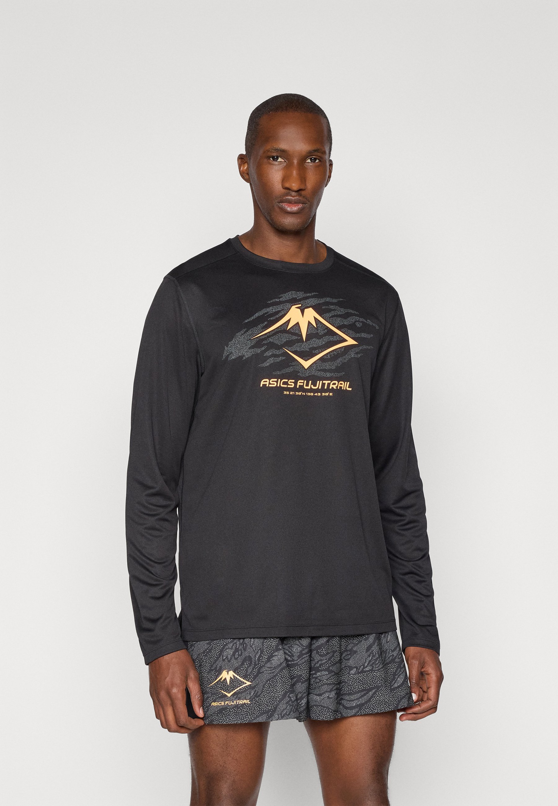 Haut ASICS FUJITRAIL LOGO - Manches longues - Noir performance