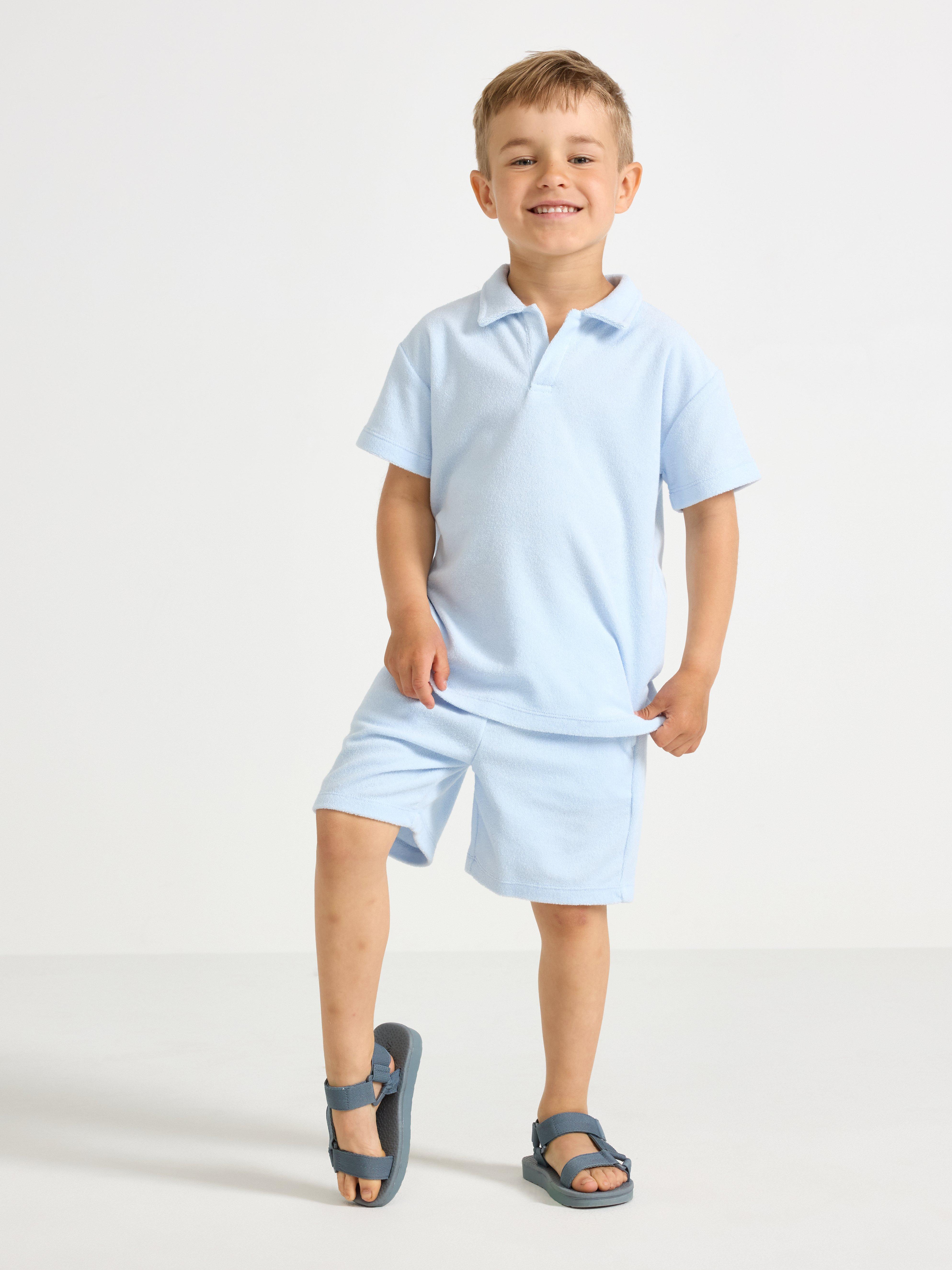 Camisa de manga curta em tecido atoalhado azul claro