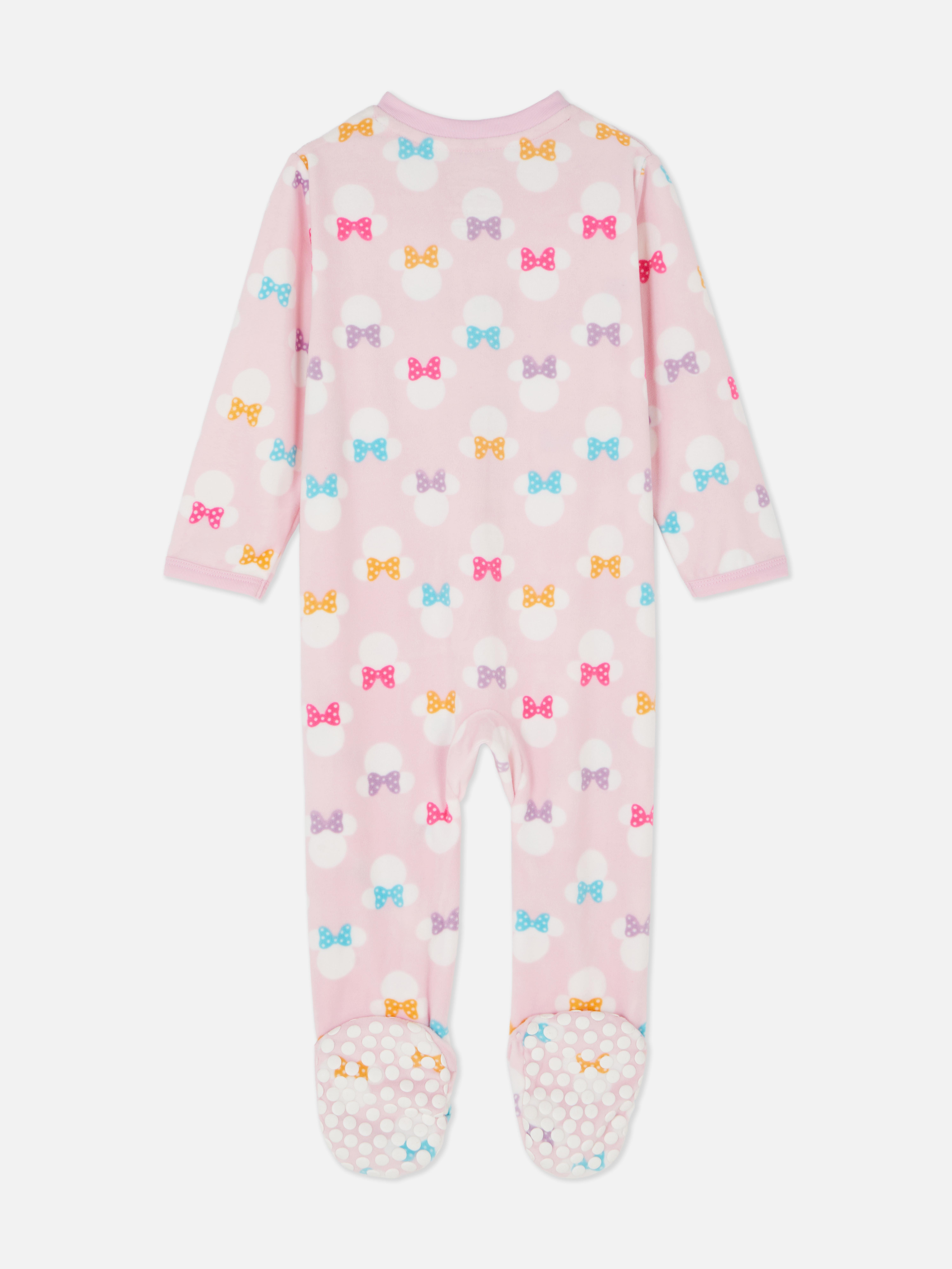 Pijamale Disney Minnie Mouse din fleece Micuța ta mini-eu arată adorabil în acest pijamale Disney din fleece moale.