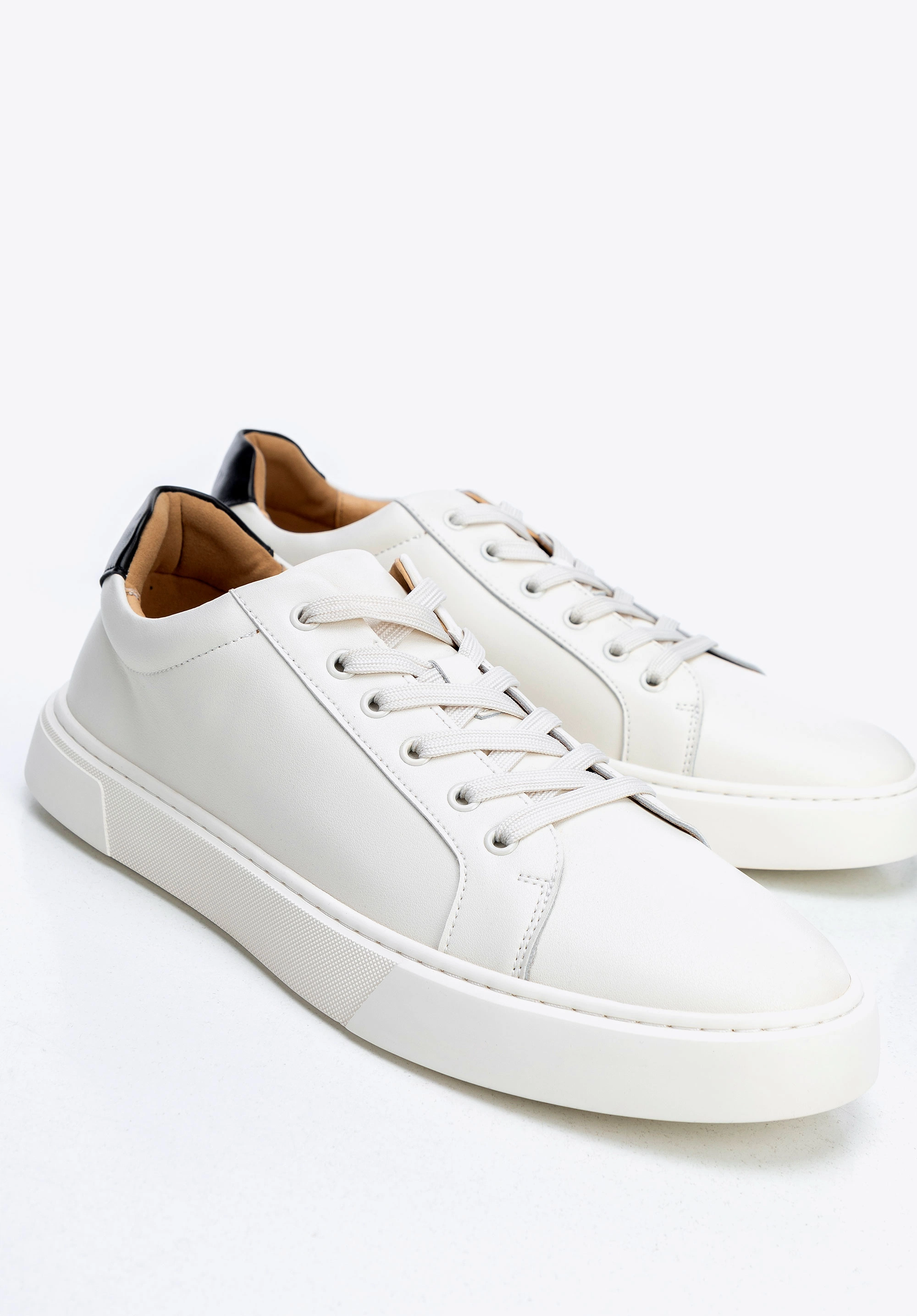 Męskie sneakersy ze skóry dwukolorowe biało - czarne