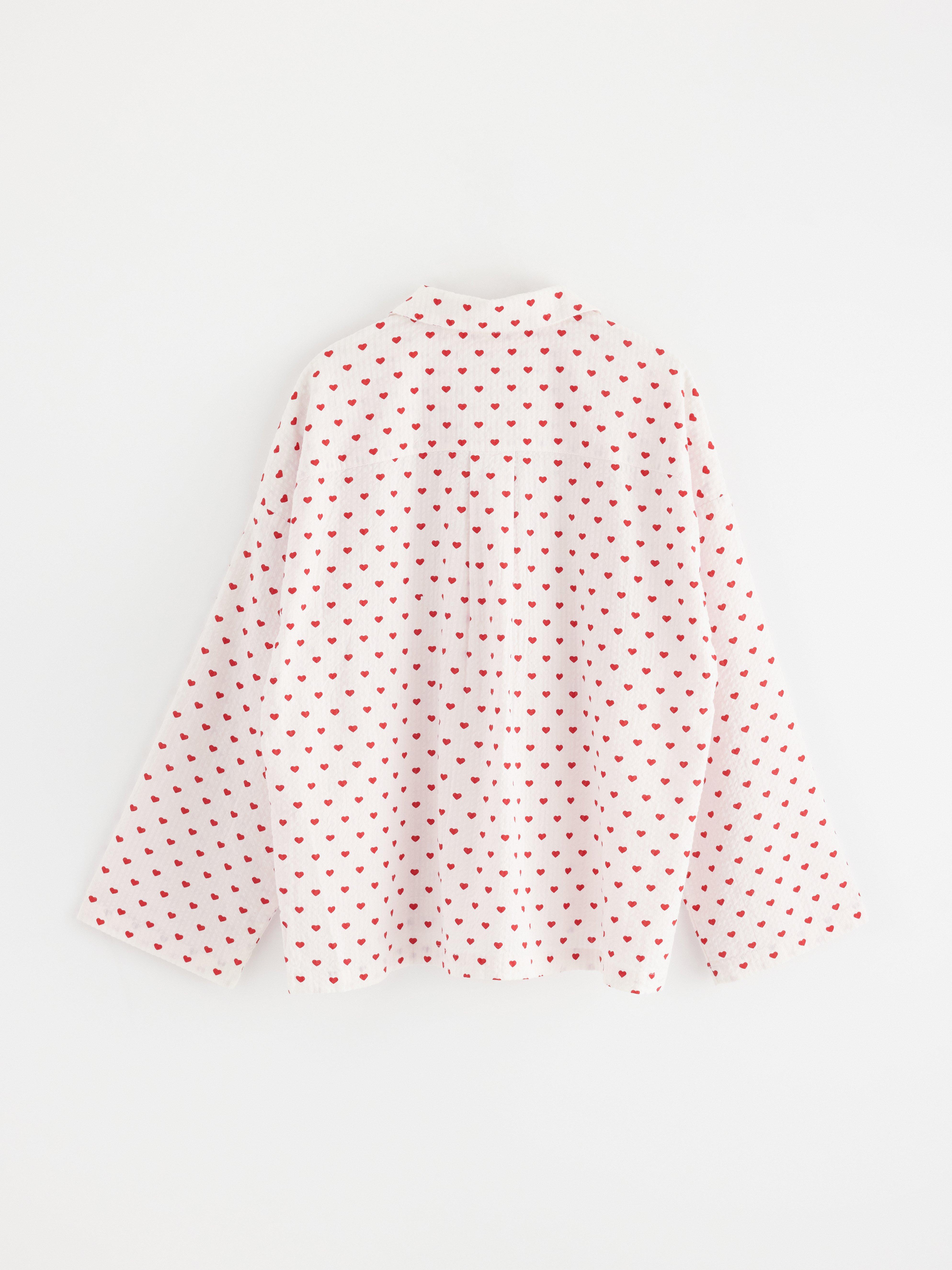 Camisola vermelha com estampa de ondas de riacho