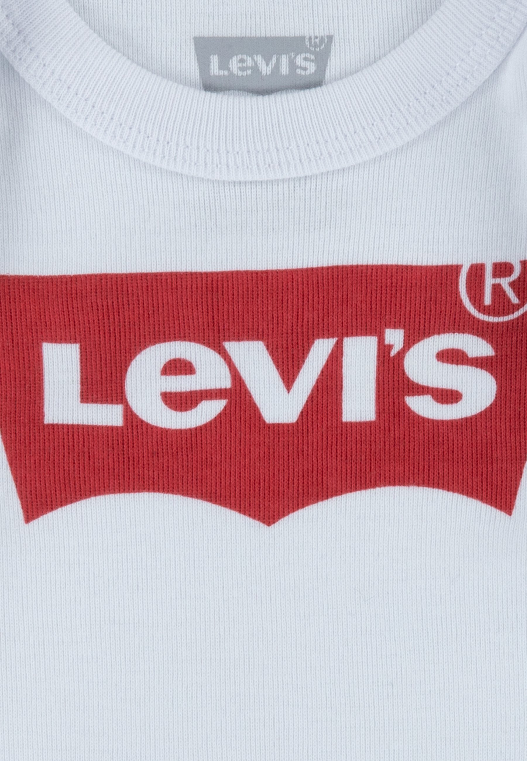 Levi's® BATWING ONESIE MET MUTSJES EN SCHOENEN UNISEX SET - Babycadeaus - wit