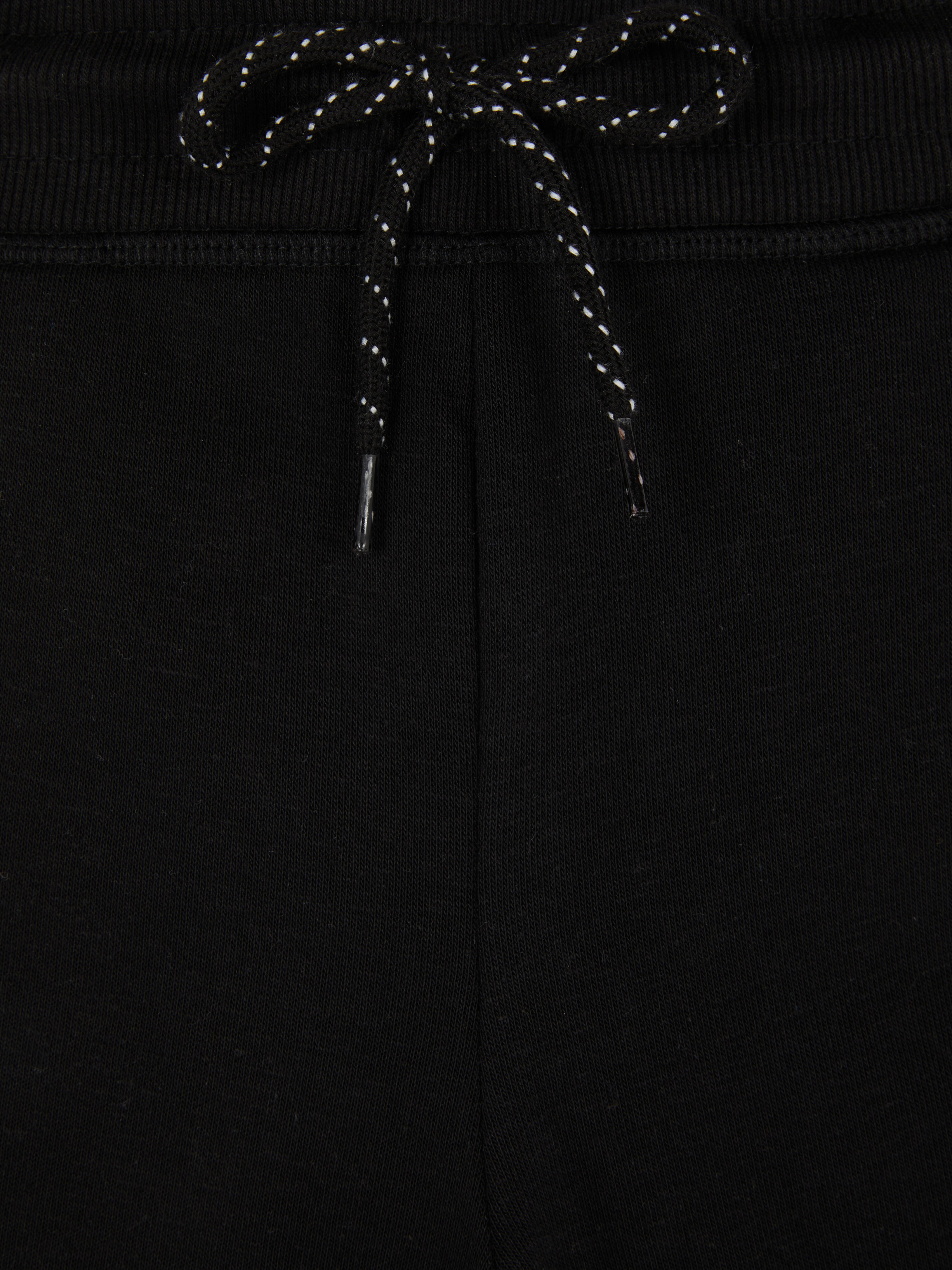 Elastische Jogginghose mit Kordelzug. Elastische Jogginghose mit Kordelzug für gemütliche Tage.