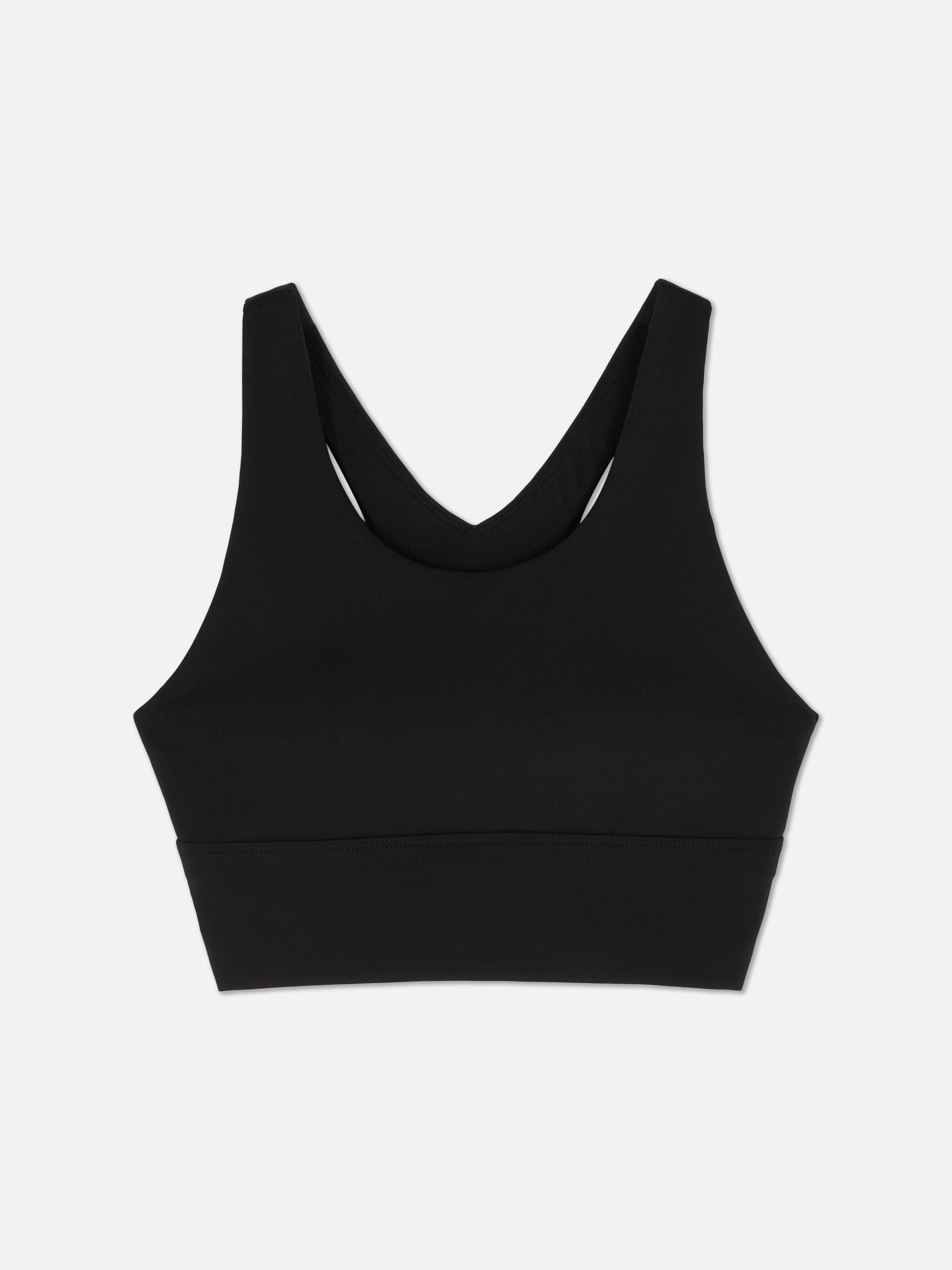 Top scurt, moale, cu imprimeu floral. Un top scurt confortabil și elegant pentru colecția ta sport.