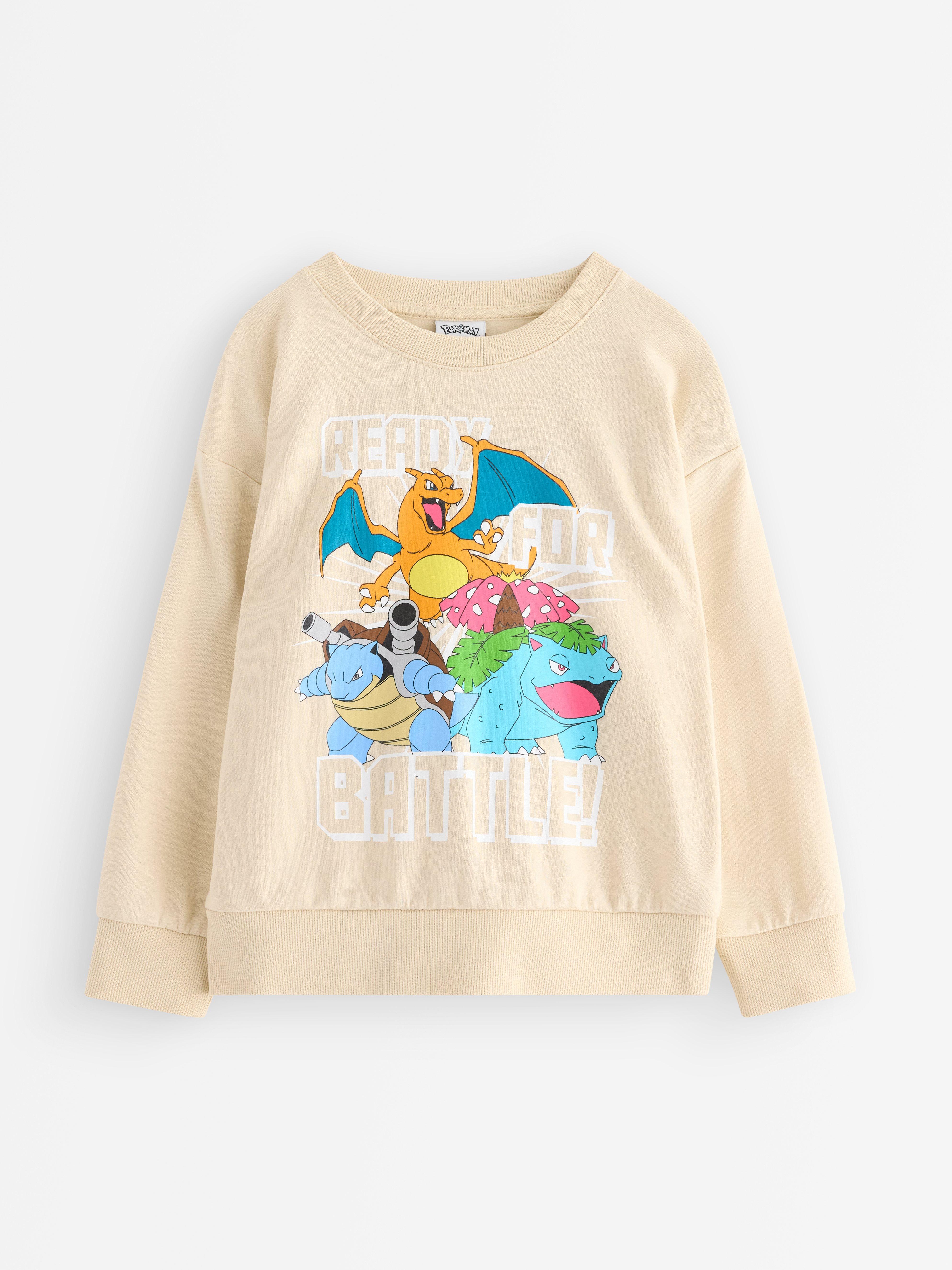 Sudadera Pokémon color beige claro