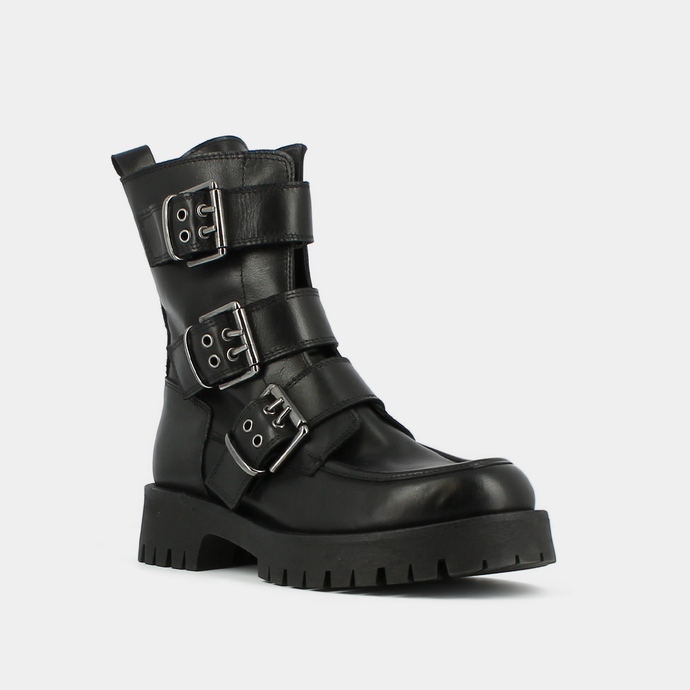 Boots à semelles crantées et sangles  en cuir noir