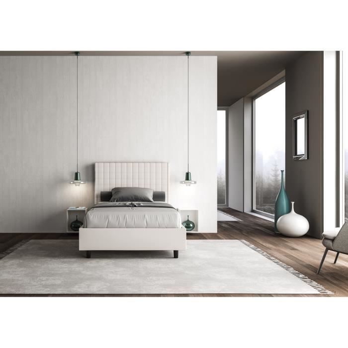 Gestoffeerd bed Sunda van 120x190 cm in wit geruit kunstleer. Zonder lattenbodem of opbergvak.
