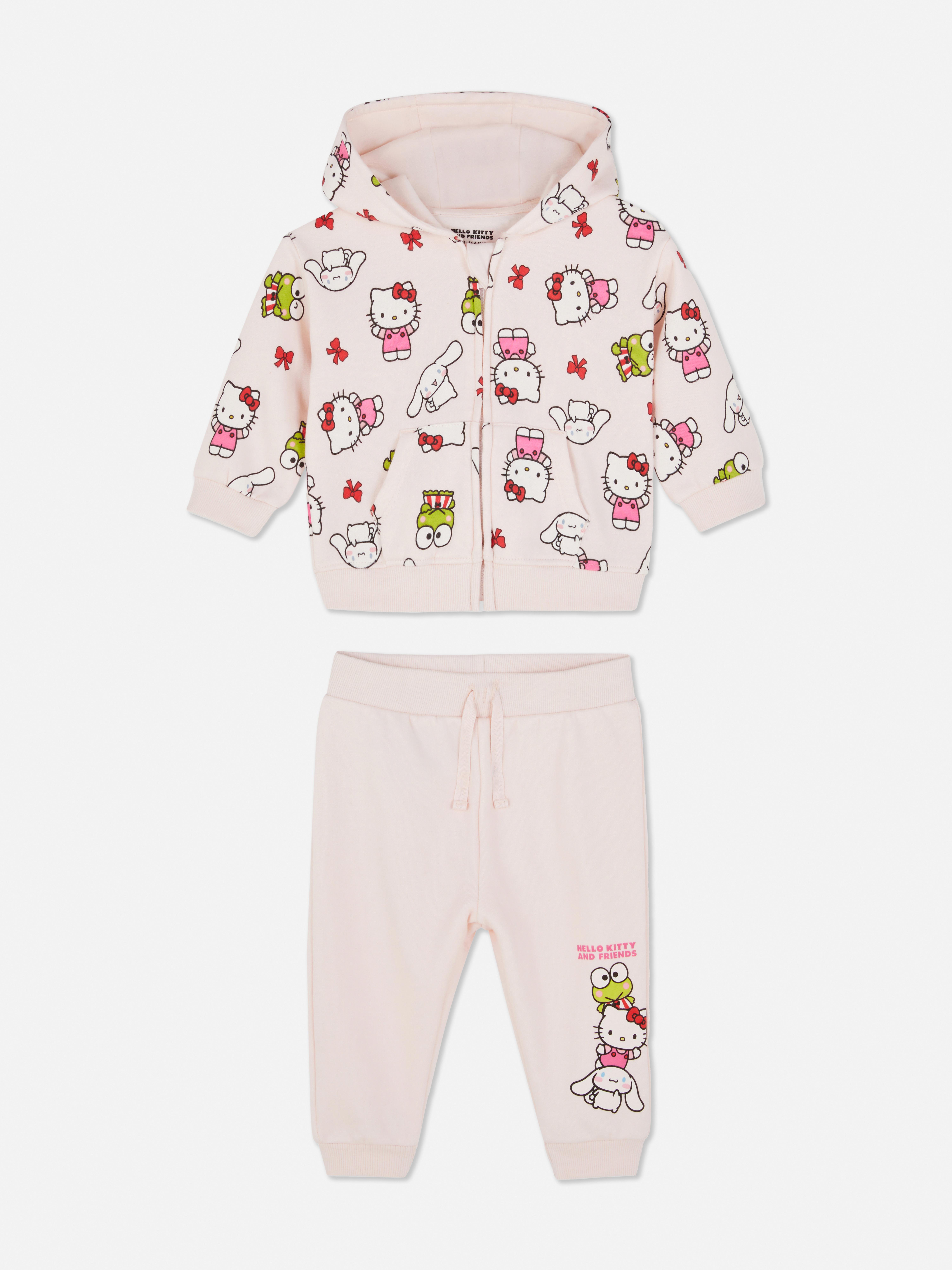 Hanorac și pantaloni de trening Hello Kitty and Friends. Hanorac cu fermoar și pantaloni de trening până la gleznă cu imprimeuri Sanrio.