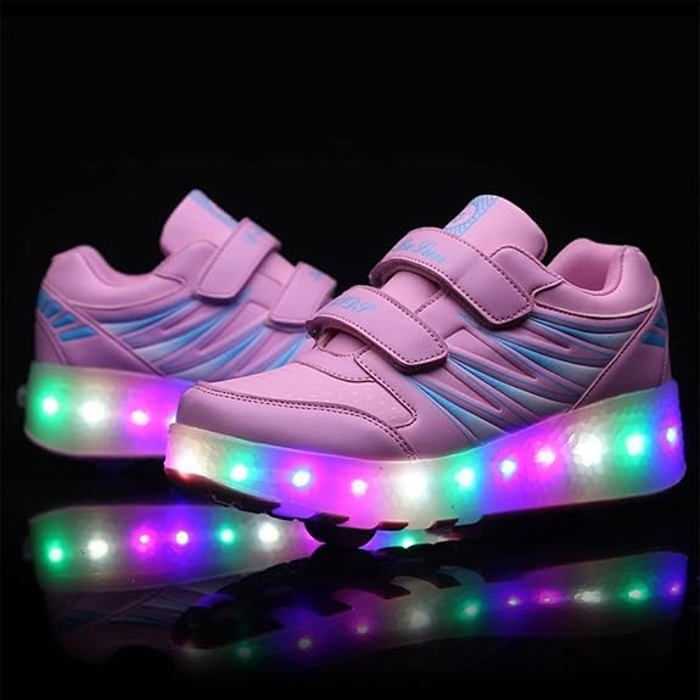 Zapatillas infantiles con ruedas y luces LED recargables por USB, color rosa.