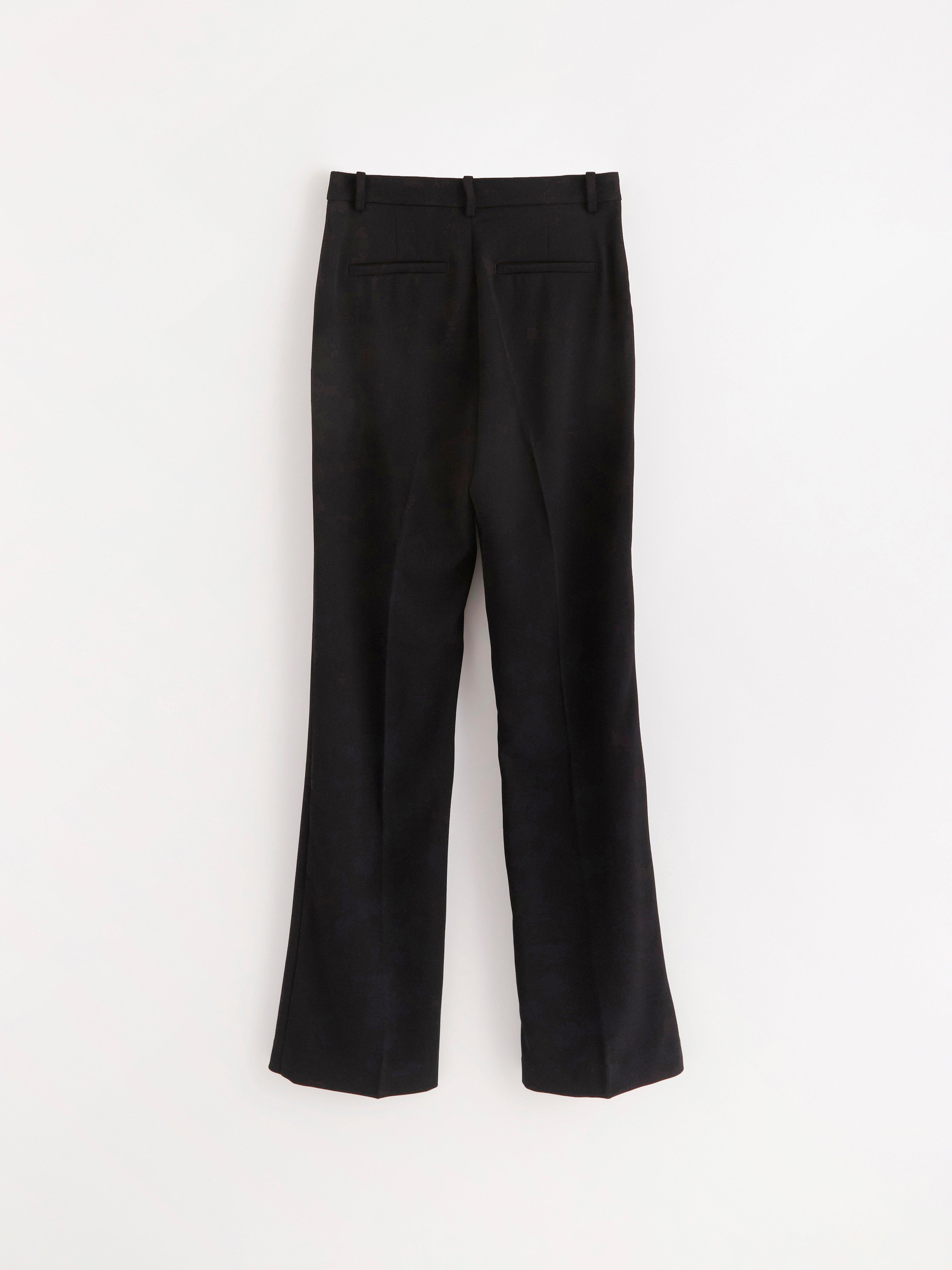 Pantalones acampanados FIONA con perneras extralargas, color negro.