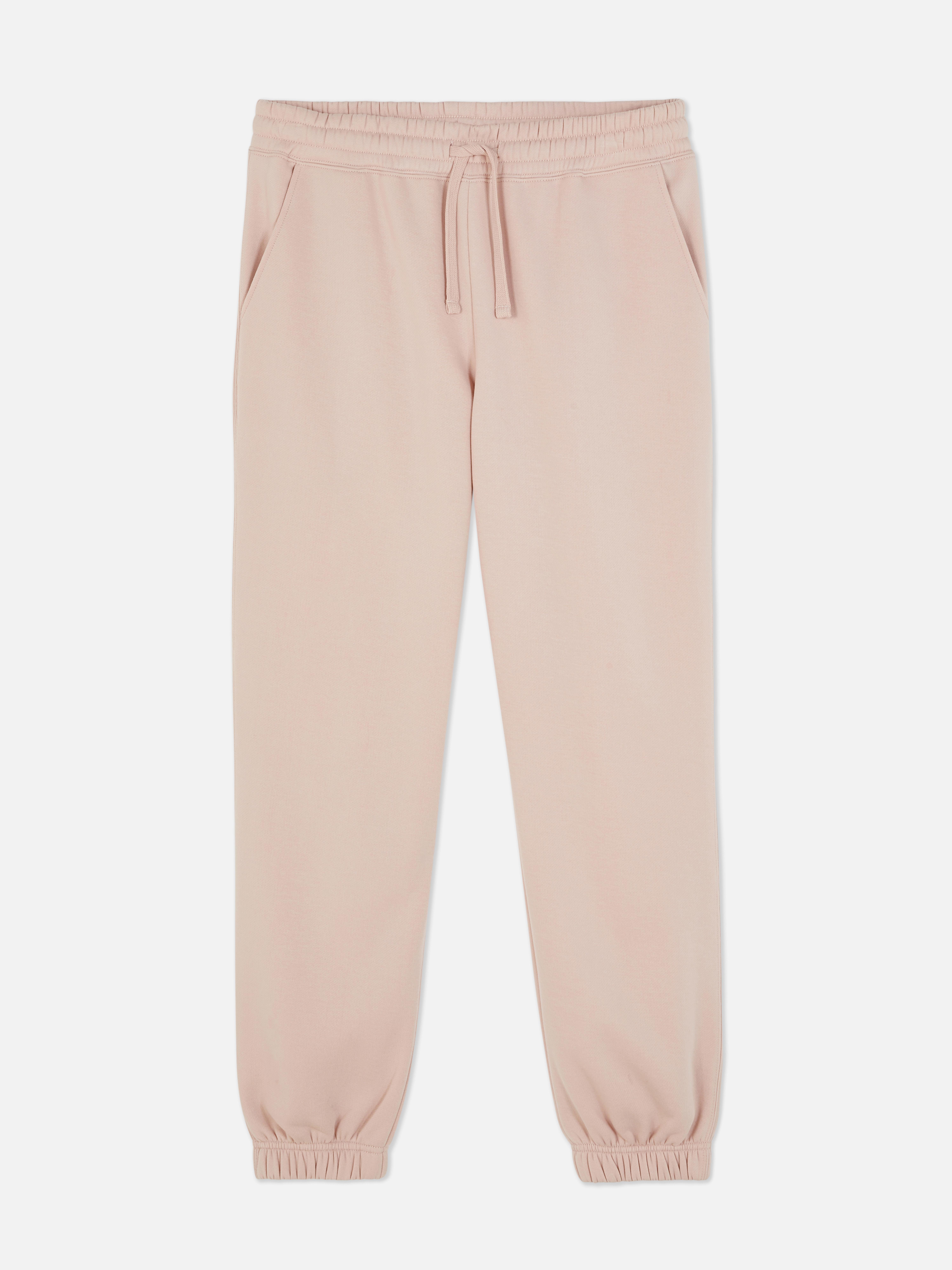 Pantaloni de jogging simpli cu croială regulată. Acești pantaloni de jogging cu manșete până la gleznă sunt indispensabili în garderoba ta casual.