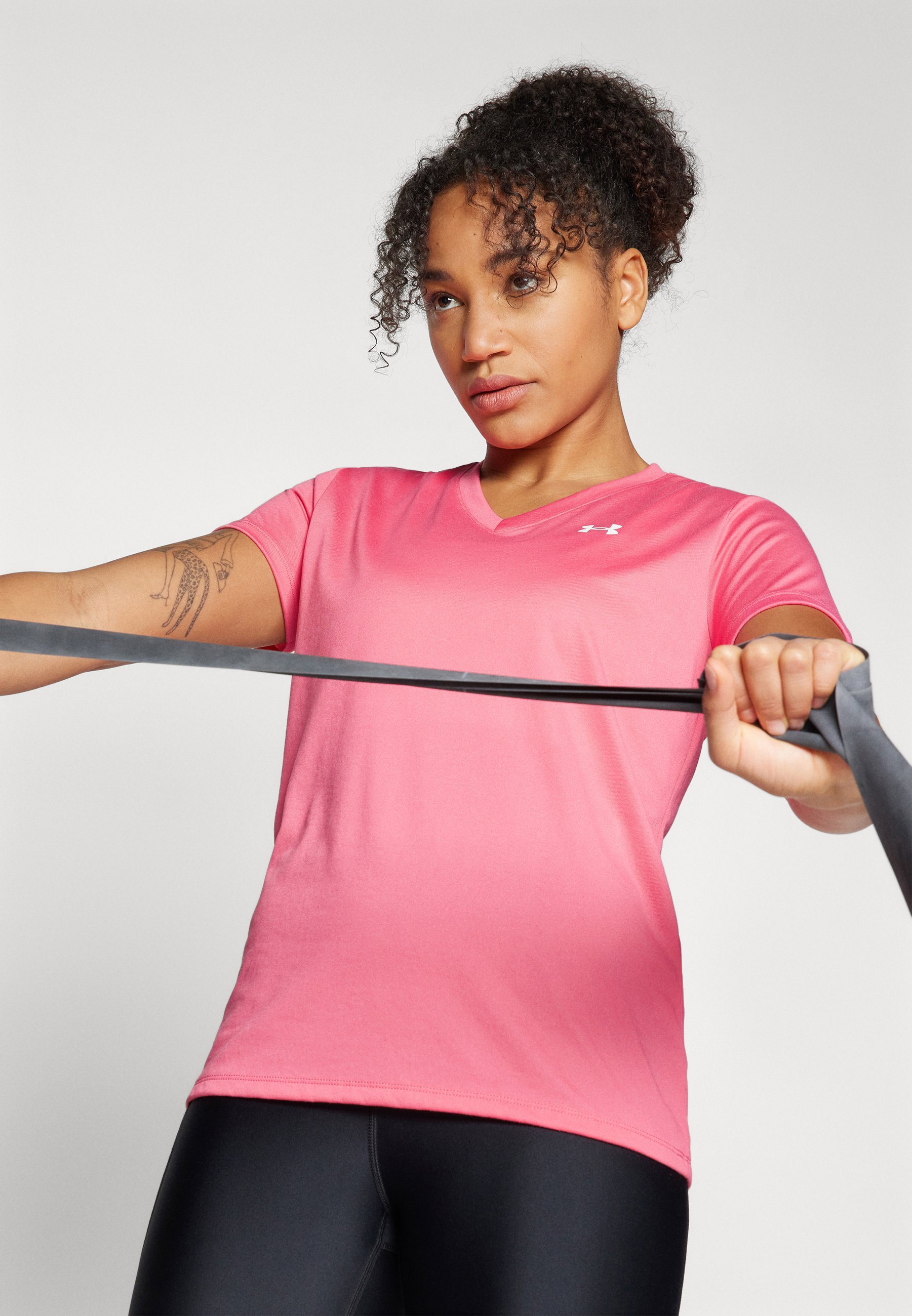 T-shirt de sport Under Armour SOLID - rose vif/blanc