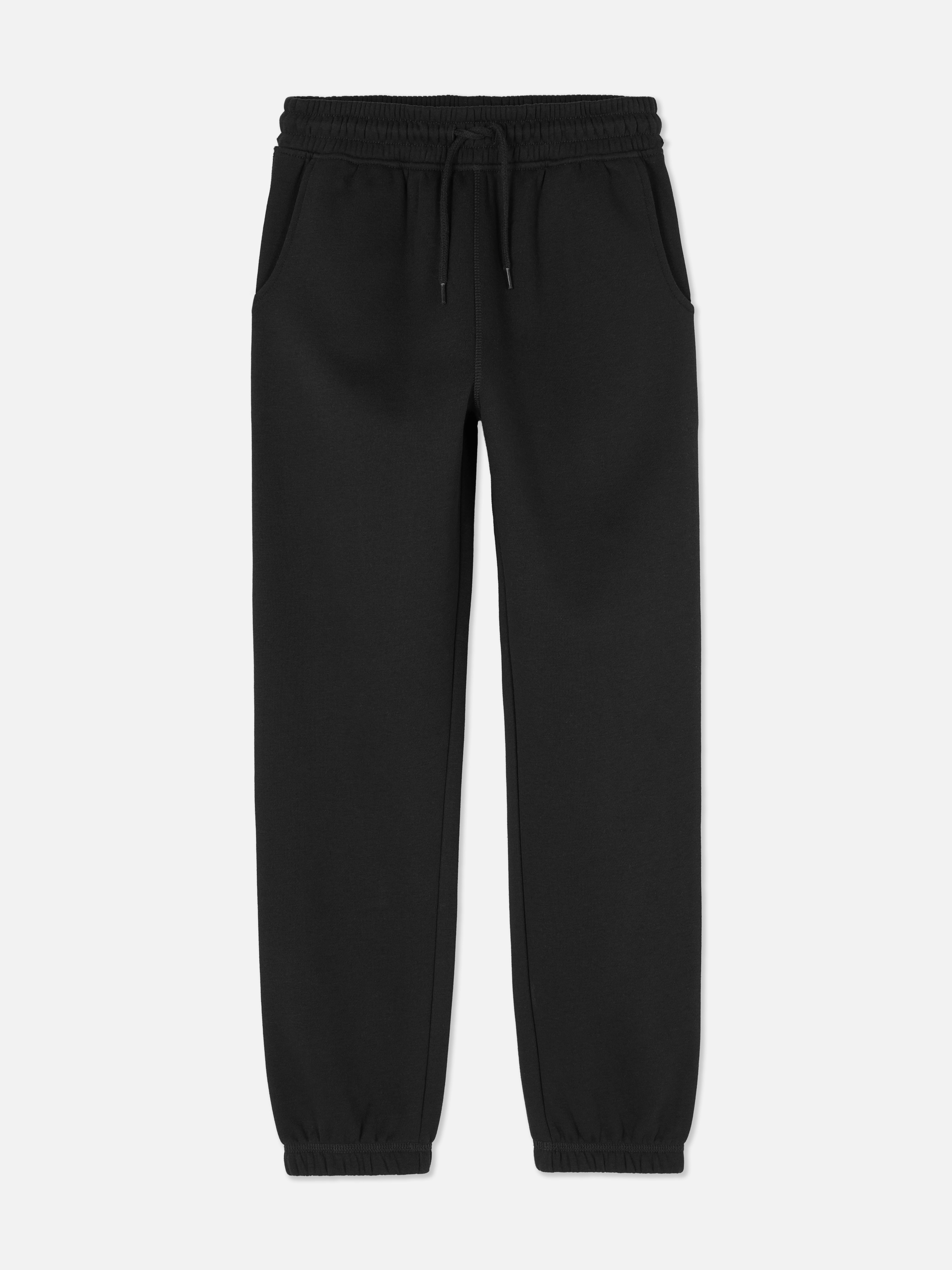 Jogginghose für Jungen mit Bund und Kordelzug. Lässige und bequeme Jogginghose mit Kordelzug im Bund, Seitentaschen und Bündchen.