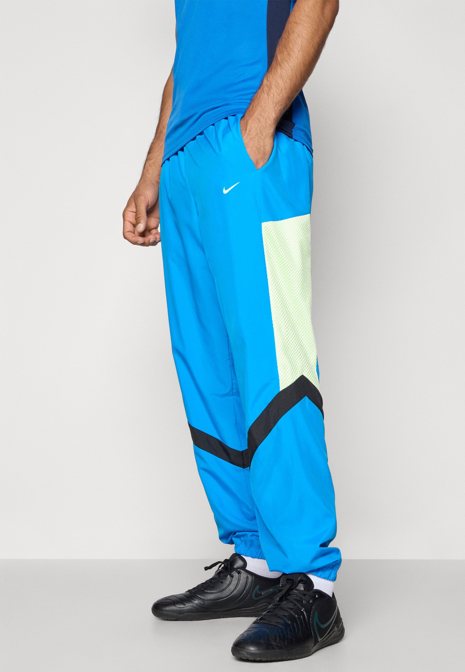 Nike Performance ICON - Spodnie dresowe - zdjęcie niebieskie/ledwie voltowe/czarne