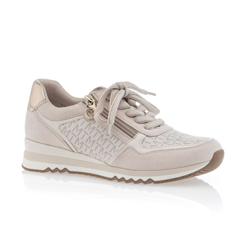 Zapatillas deportivas para mujer color beige.