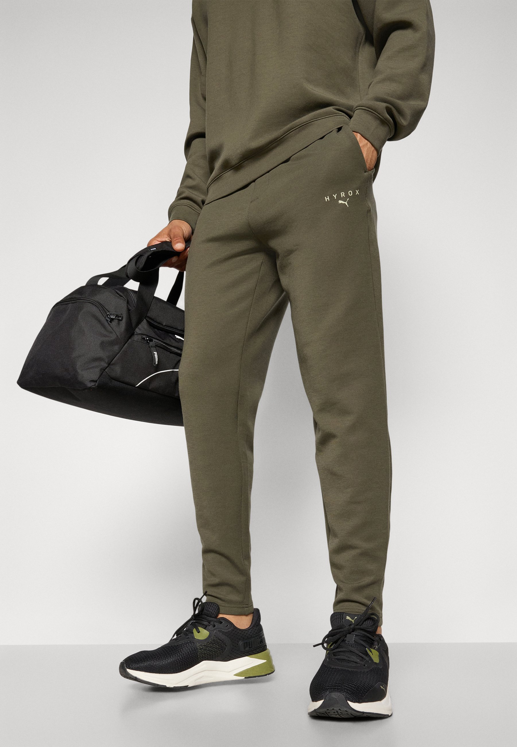 Puma HYROX CLOUDSPUN ELEVATED PANT - Teplákové kalhoty - black