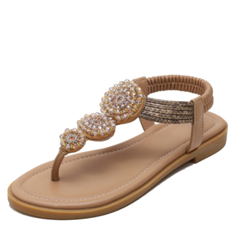 Sandali estivi da donna europei e americani 2021, stile bohémien romano, con suola piatta, stile fatato, scarpe da spiaggia per vacanze al mare.