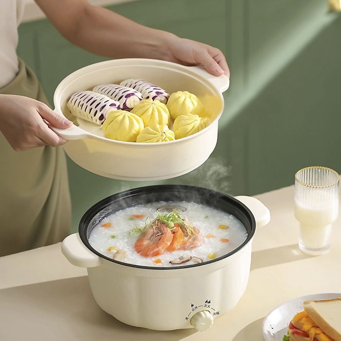 DAM Multifunktions-Elektrokocher. Drei Temperaturstufen, 2,5 l Fassungsvermögen (zweistufig). Geeignet für Hot Pot, Wokgerichte usw. Maße: 28,5 x 22 x 23 cm. Farbe: Weiß.