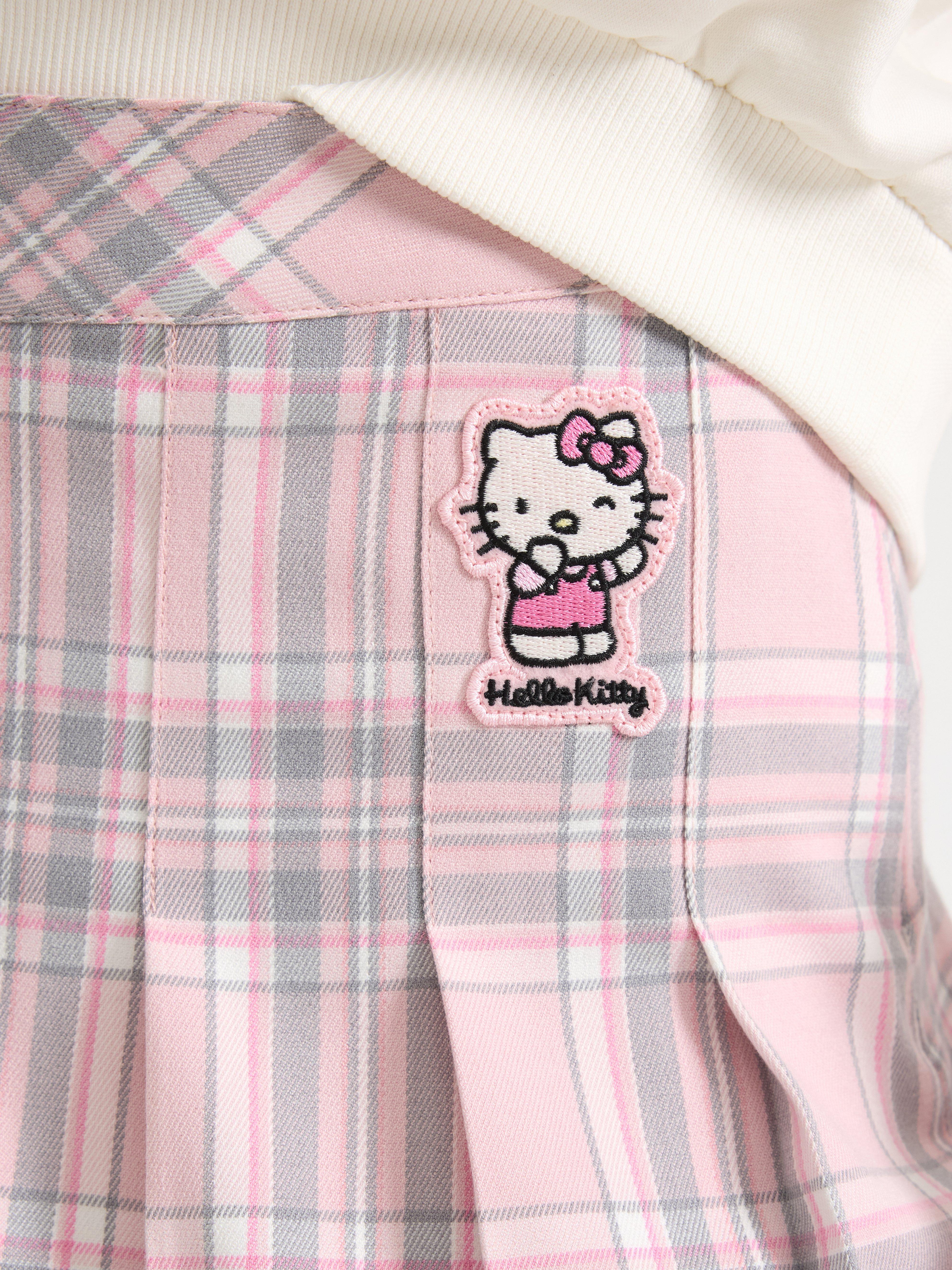 Saia plissada Hello Kitty rosa claro