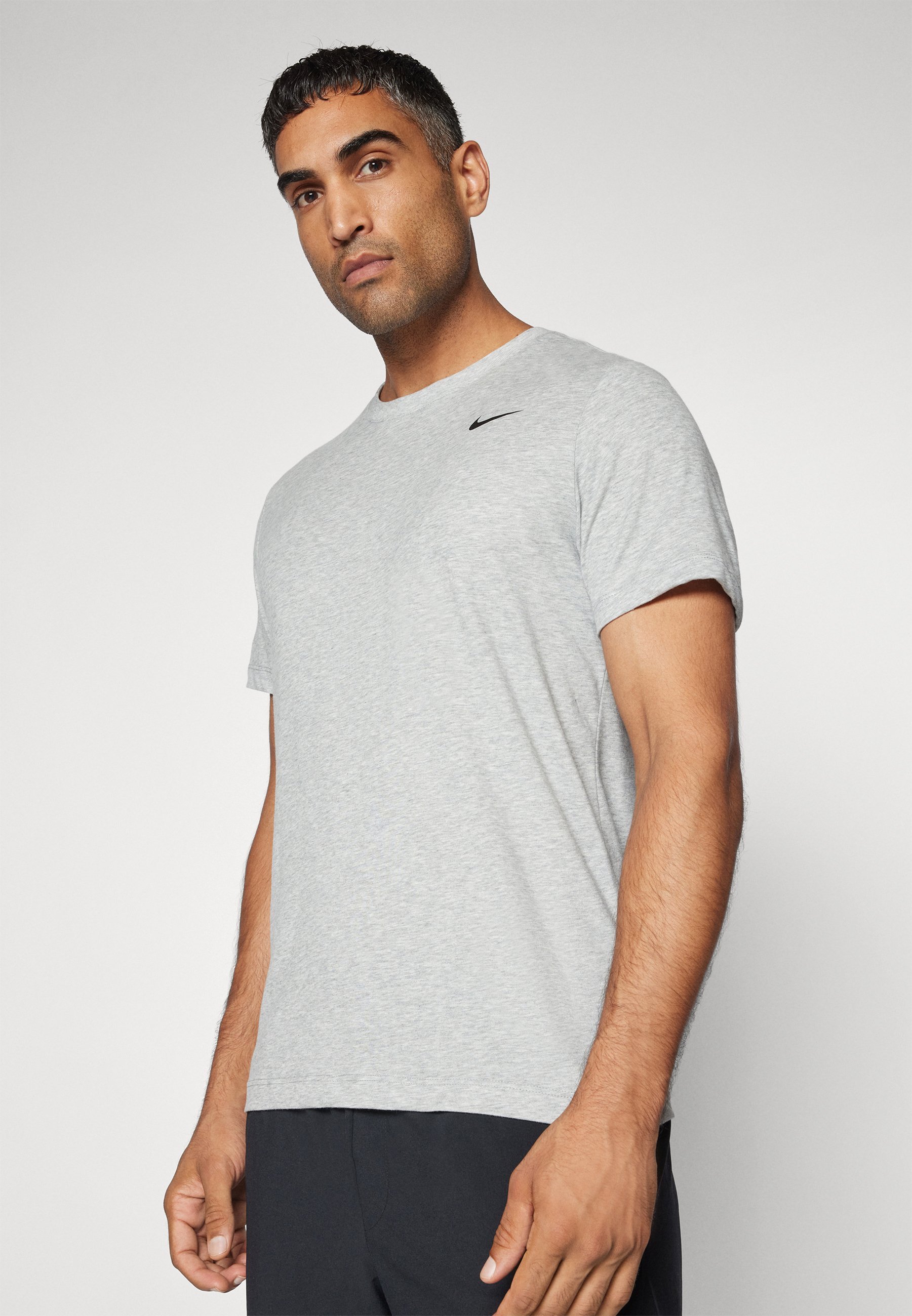 Nike Performance CREW SOLID - Sport T-shirt - donkergrijs gemêleerd/zwart