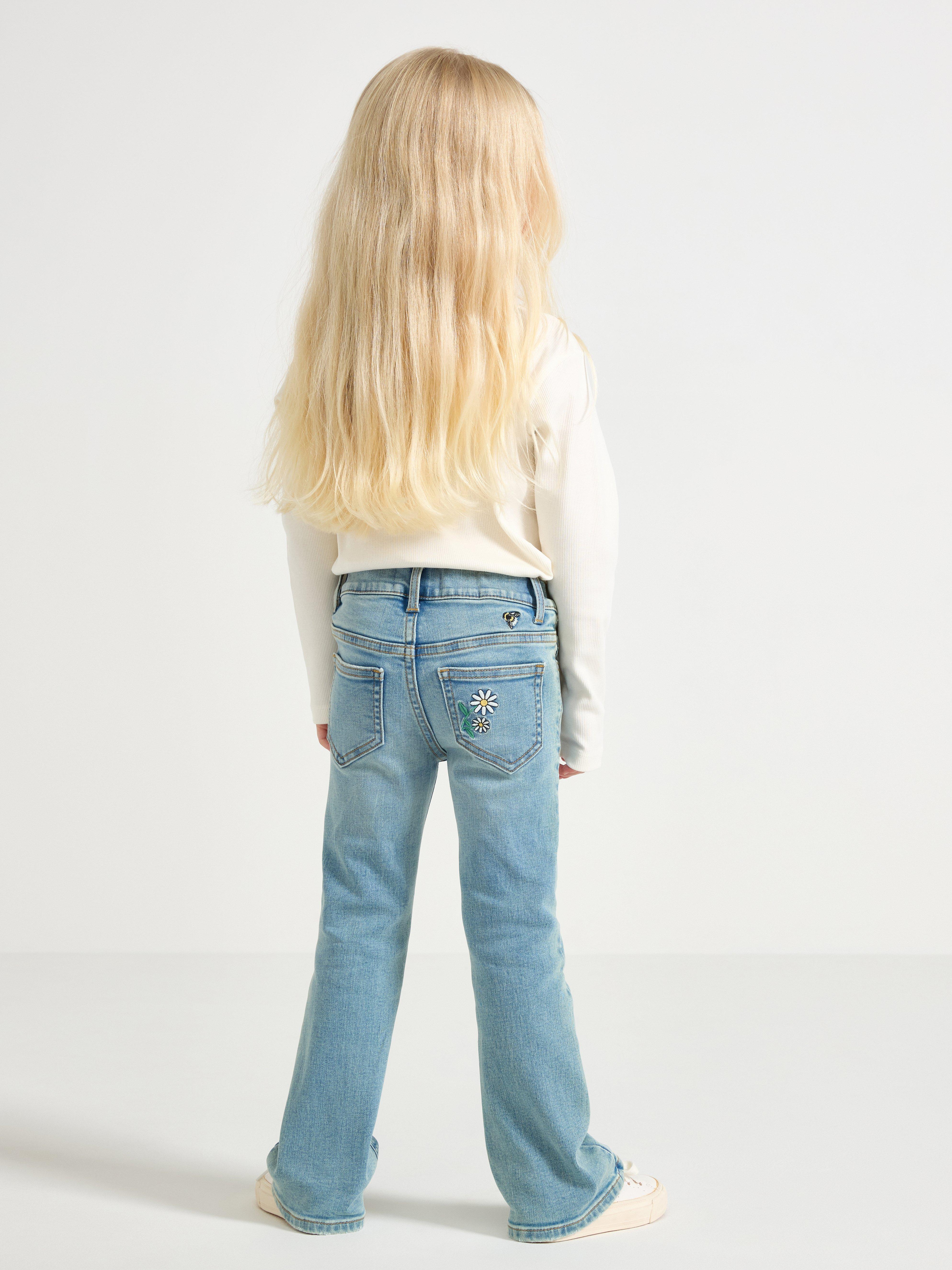 FREJA Jeans acampanados con bordados, mezclilla clara