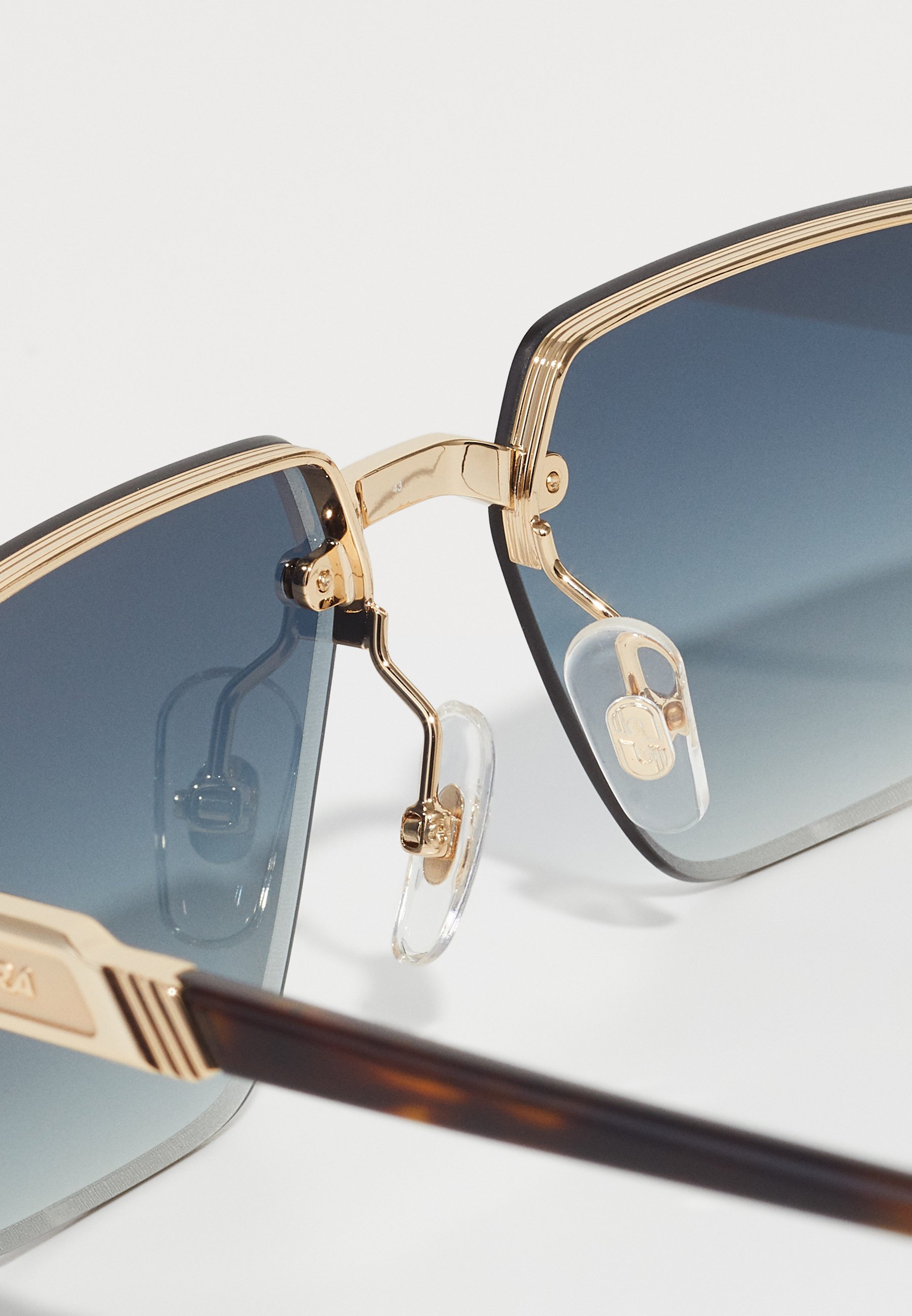 Lunettes de soleil Carrera - couleur or/marron havane