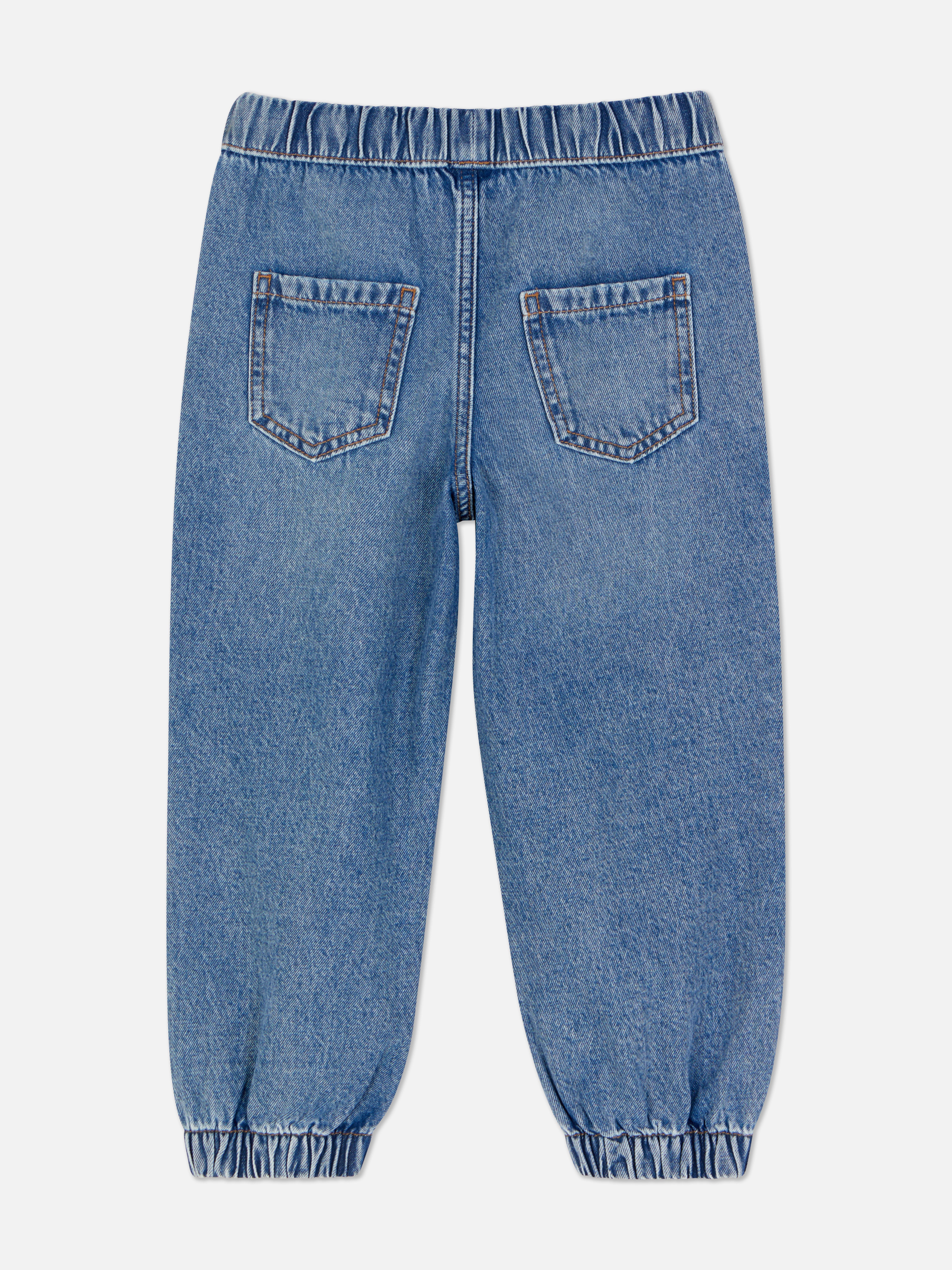 Joggingjeans Een joggingjeans met zakken, enkelboorden en trekkoord in de taille