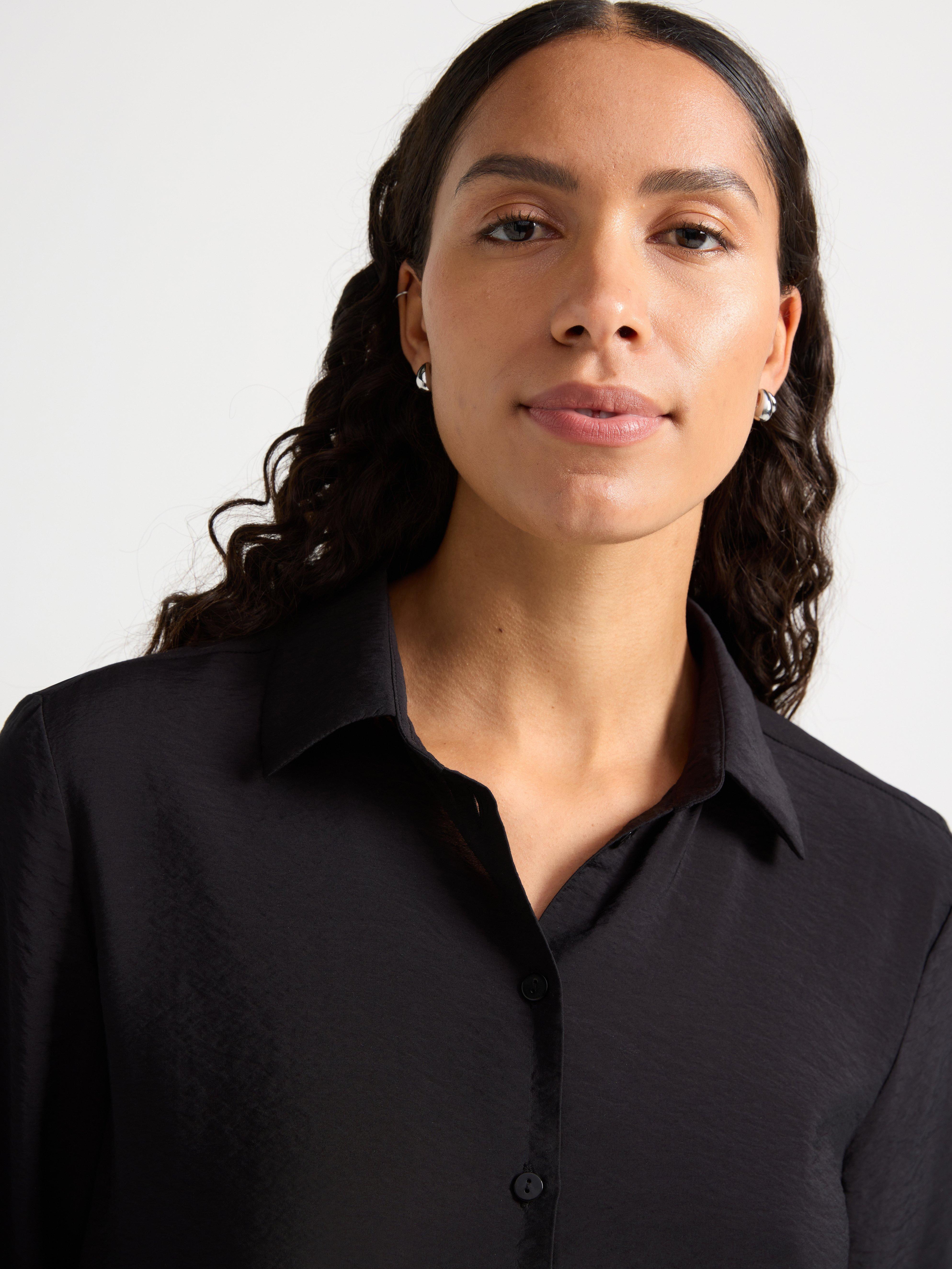 Camisa de manga larga negra