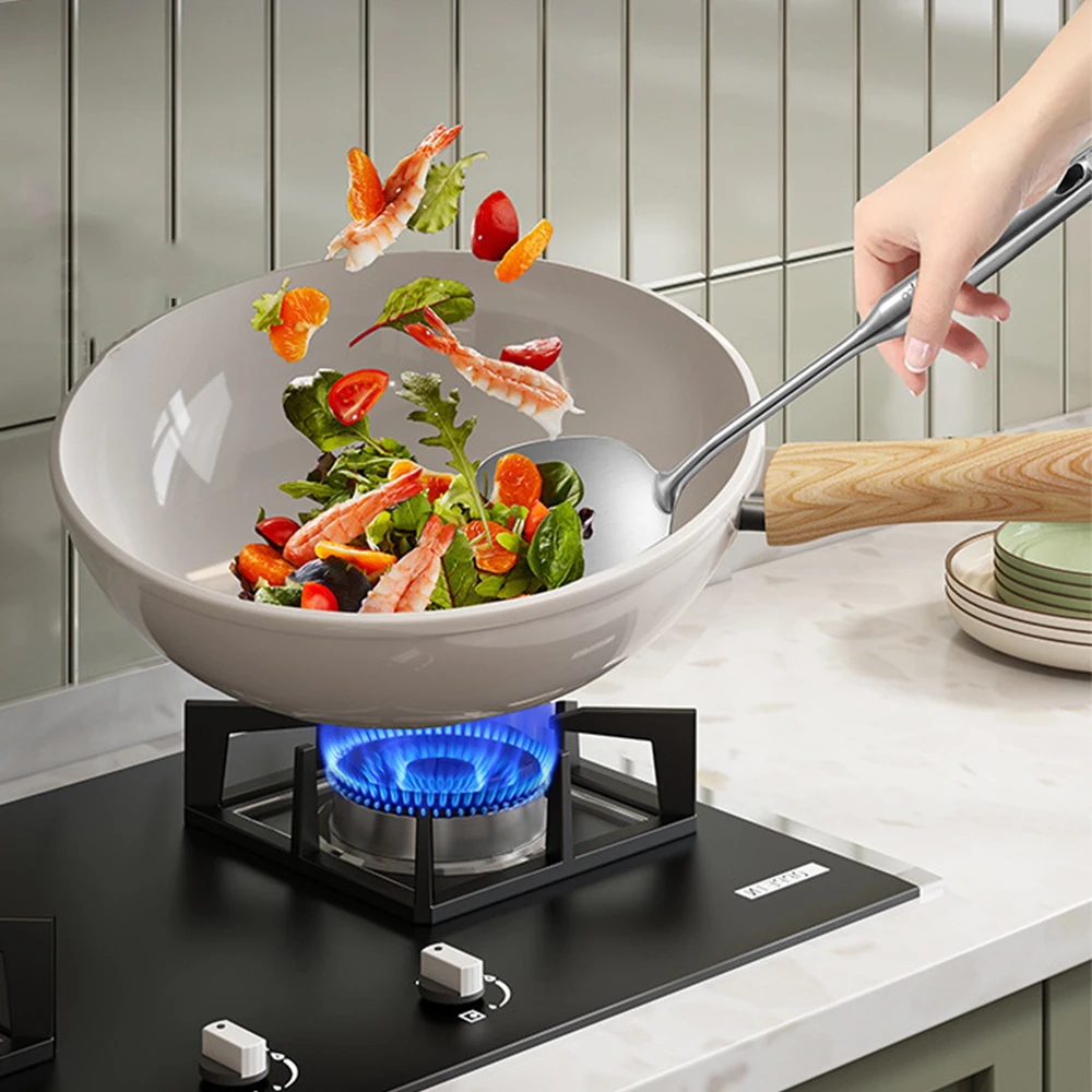 Poêle wok antiadhésive en céramique de 30 cm, idéale pour la cuisson des steaks, des crêpes et autres aliments. Compatible avec les plaques à induction et à gaz.