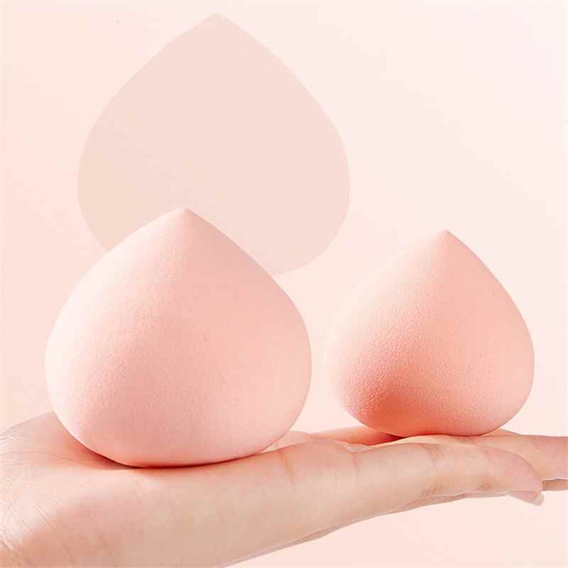 Éponge à maquillage en forme de goutte d'eau de pêche, éponge cosmétique professionnelle pour fond de teint, correcteur et crème, estompe le maquillage en douceur.