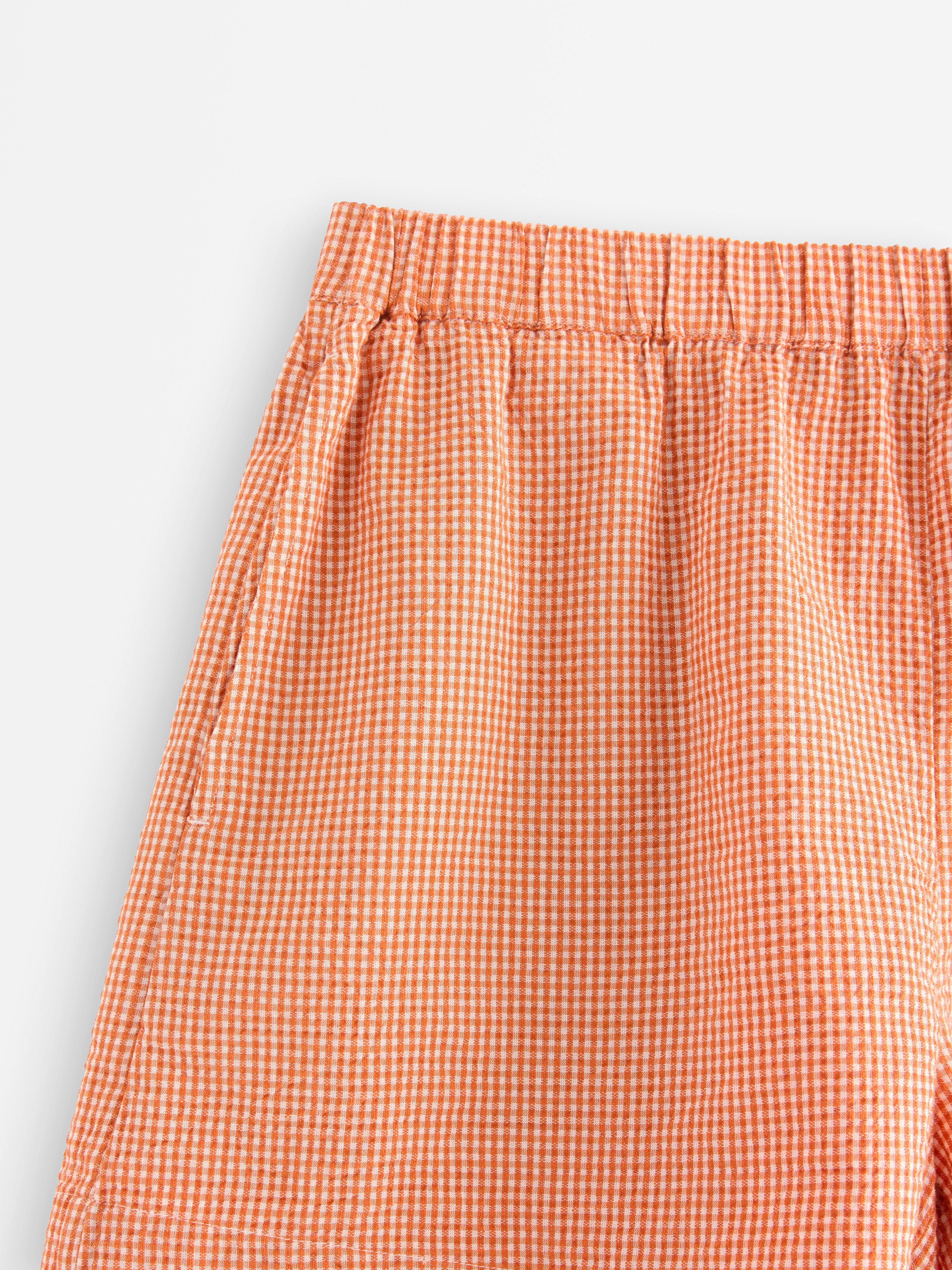 Pyžamové kraťasy Dusty Orange s vlnovkou potoka
