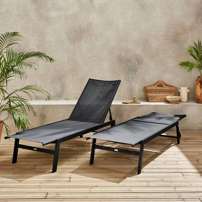 Set di 2 lettini prendisole neri. 5 posizioni. Realizzati in textilene e metallo. FLORA. L155 x P59 x H106 cm