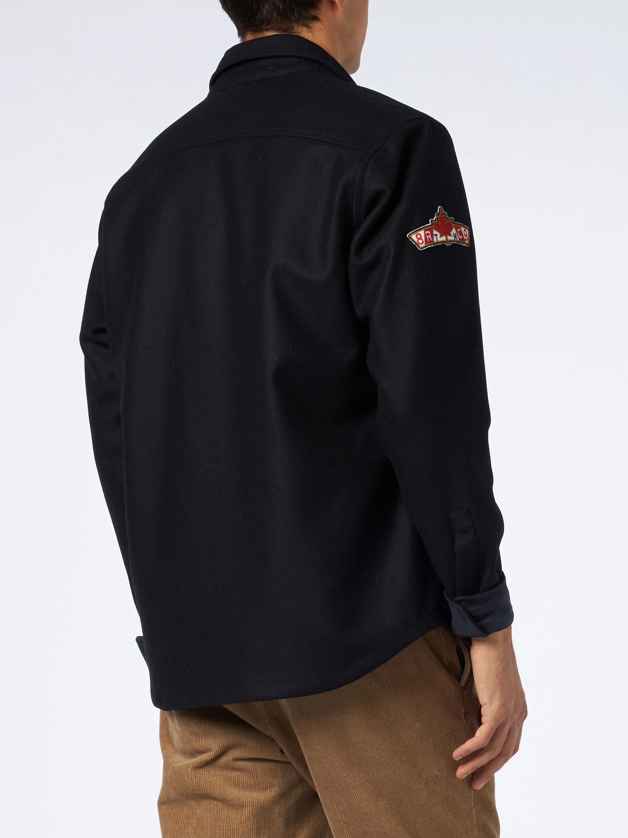 Herenhemd van blauwe wol met zakken en patches