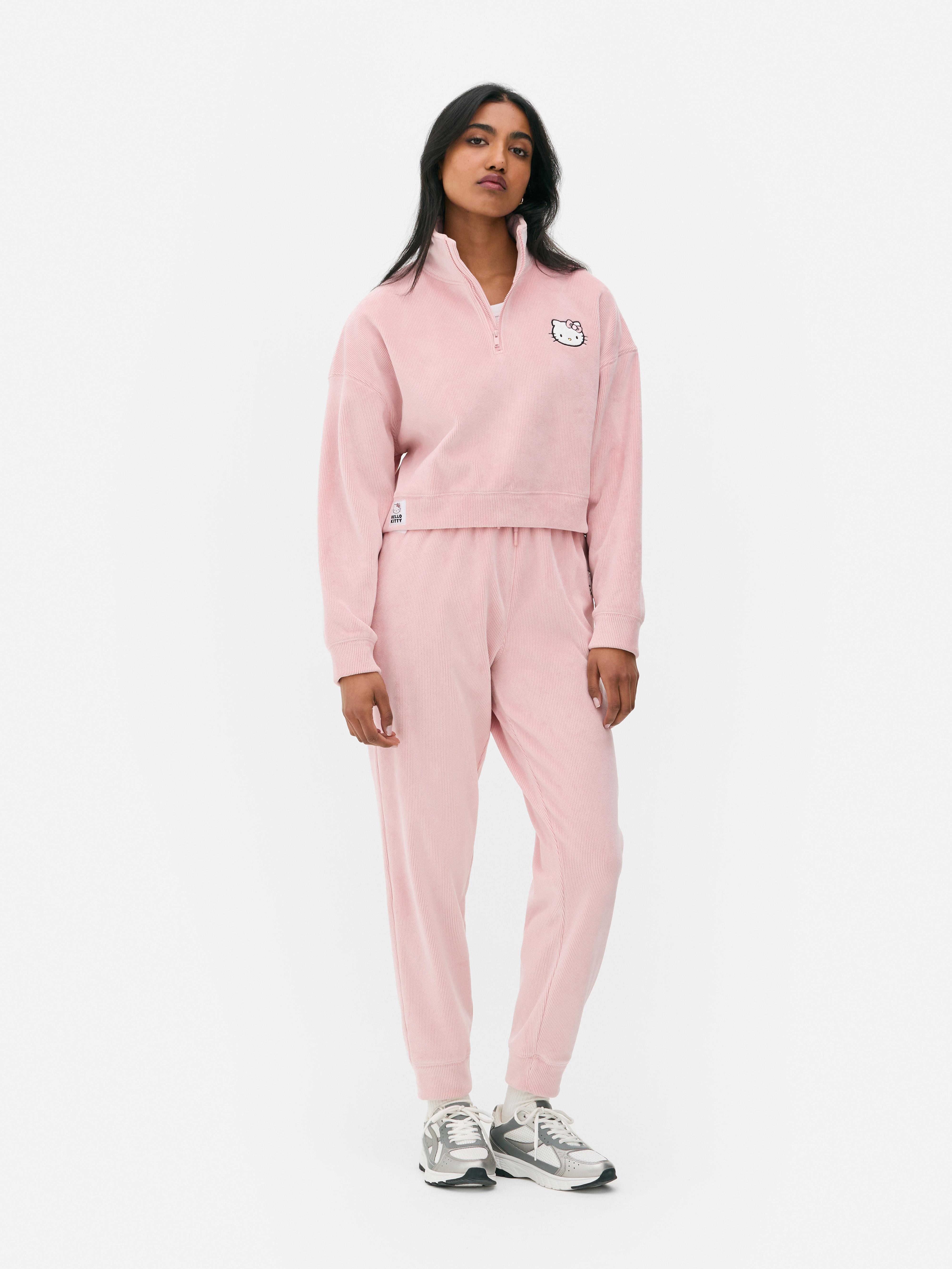 Bluza welurowa Hello Kitty Bluza welurowa Hello Kitty z zamkiem błyskawicznym o długości 1/4 i długimi rękawami