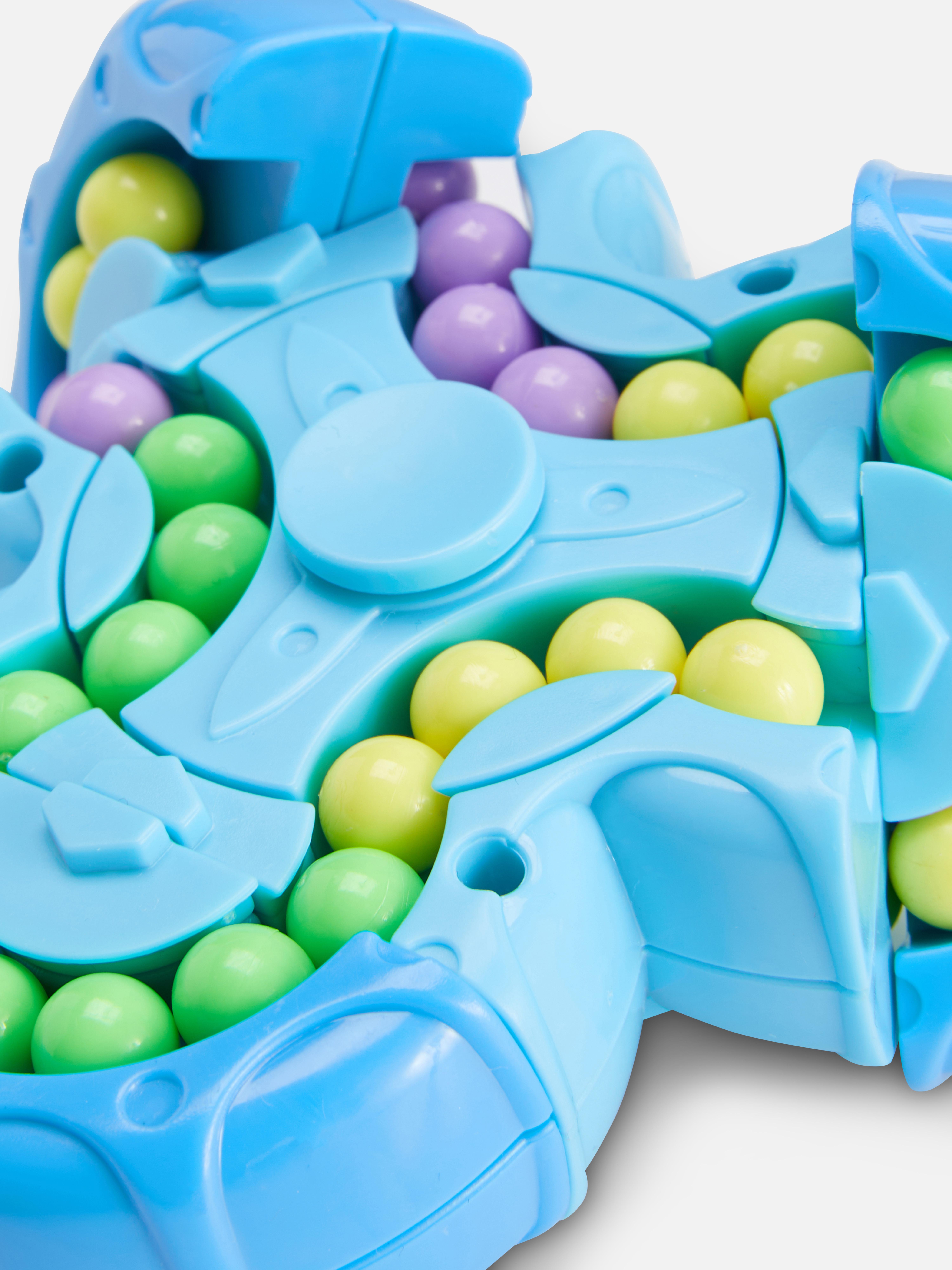 Gyöngypuzzle Egy interaktív kirakós játék izguló pörgettyű formájában