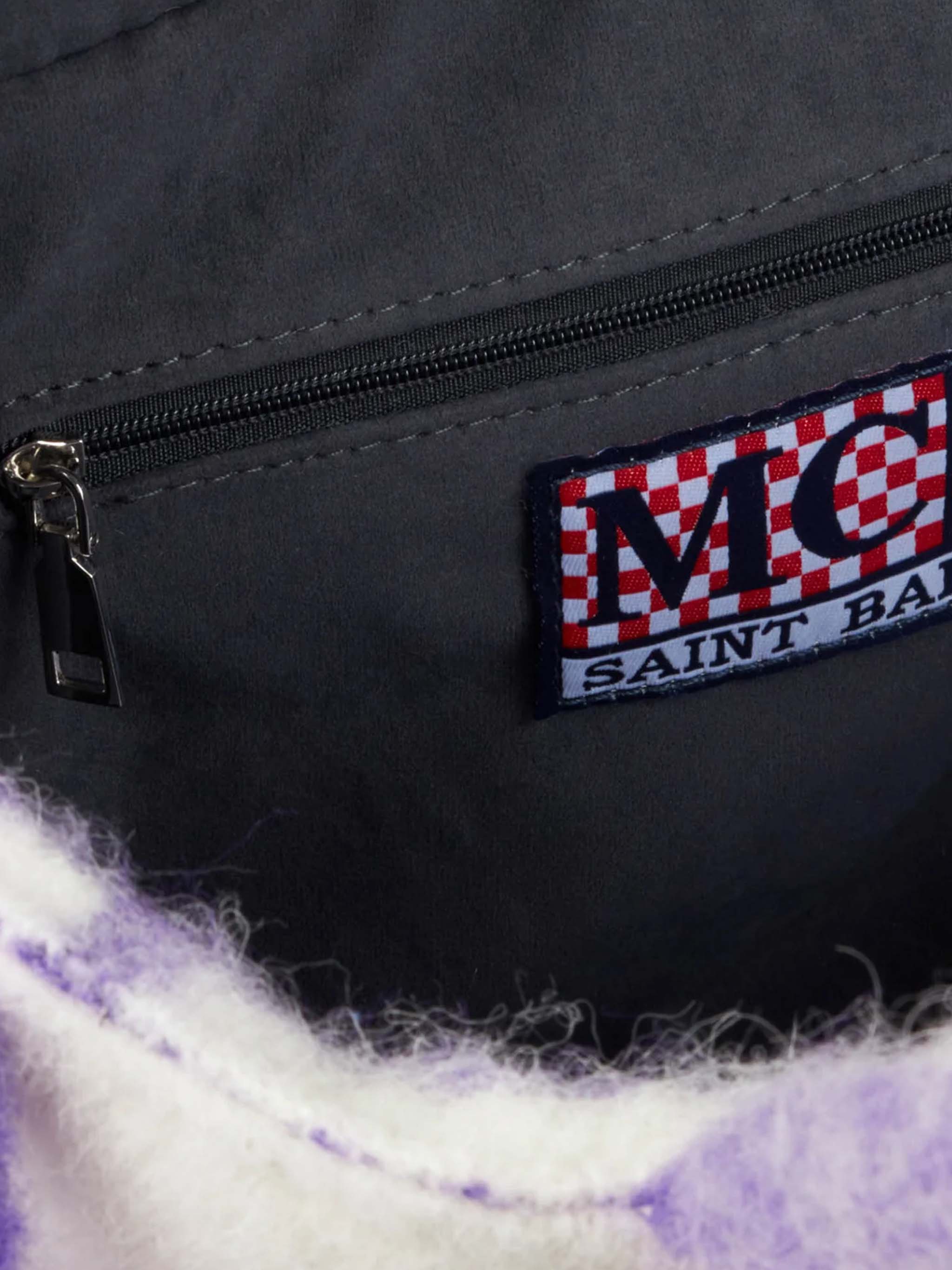 Colette-tas bedekt met tartanprint.