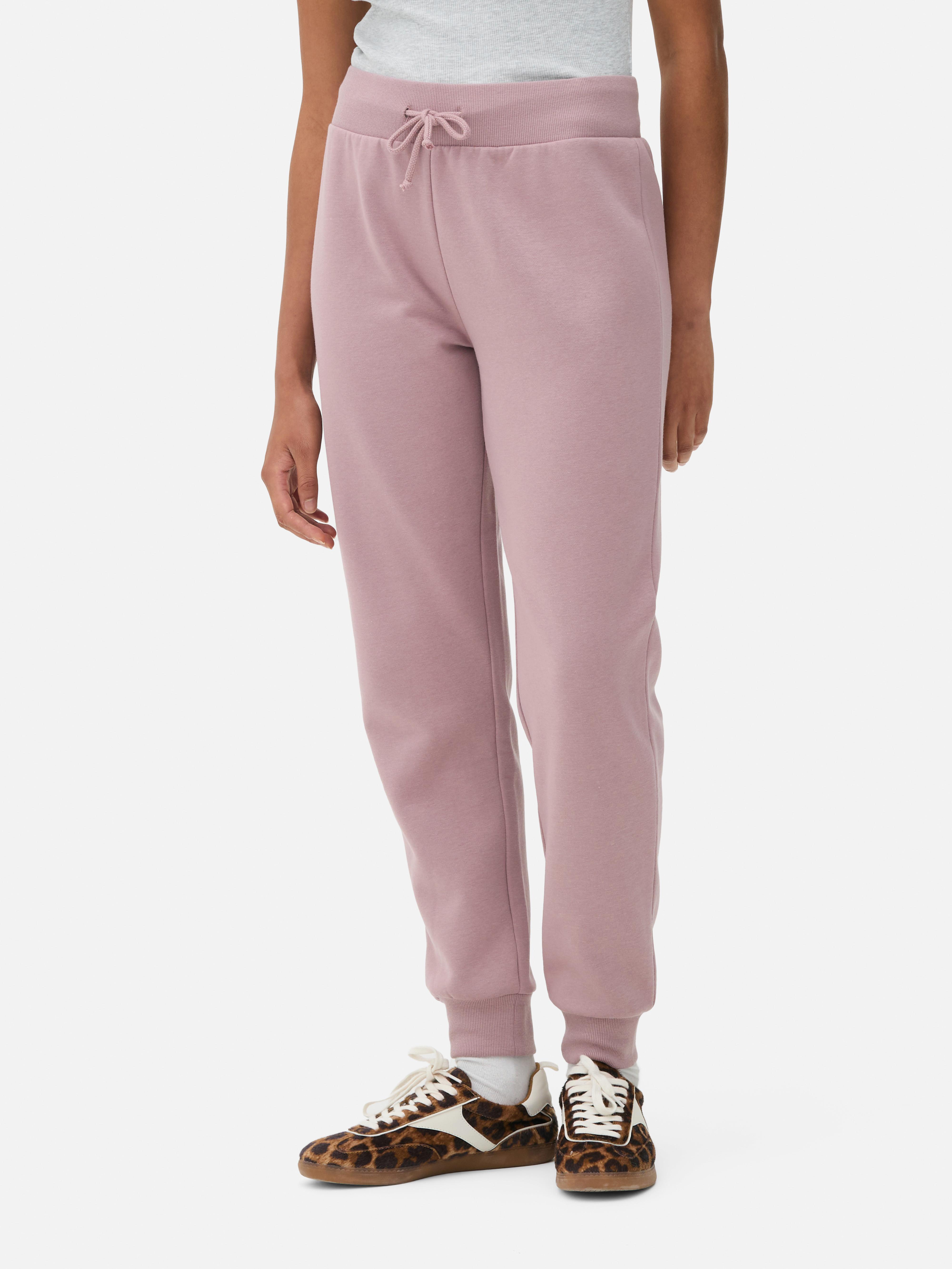 Pantaloni de trening skinny Acești pantaloni de trening slim fit cu manșete la gleznă creează un aspect elegant pentru momente elegante și zile active.